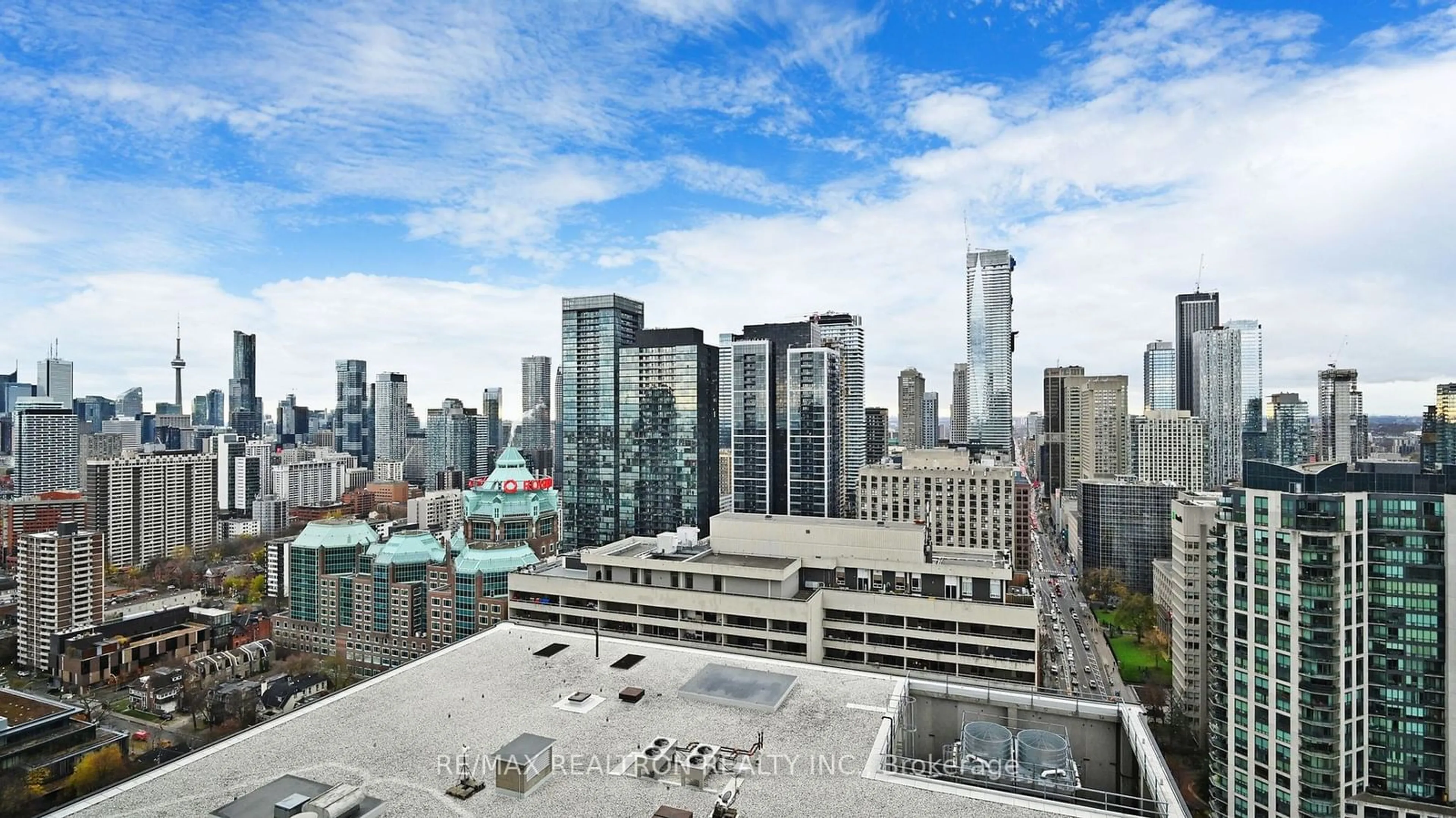 A pic from exterior of the house or condo, the view of city buildings for 395 BLOOR St #3104, Toronto Ontario M4W 1H7