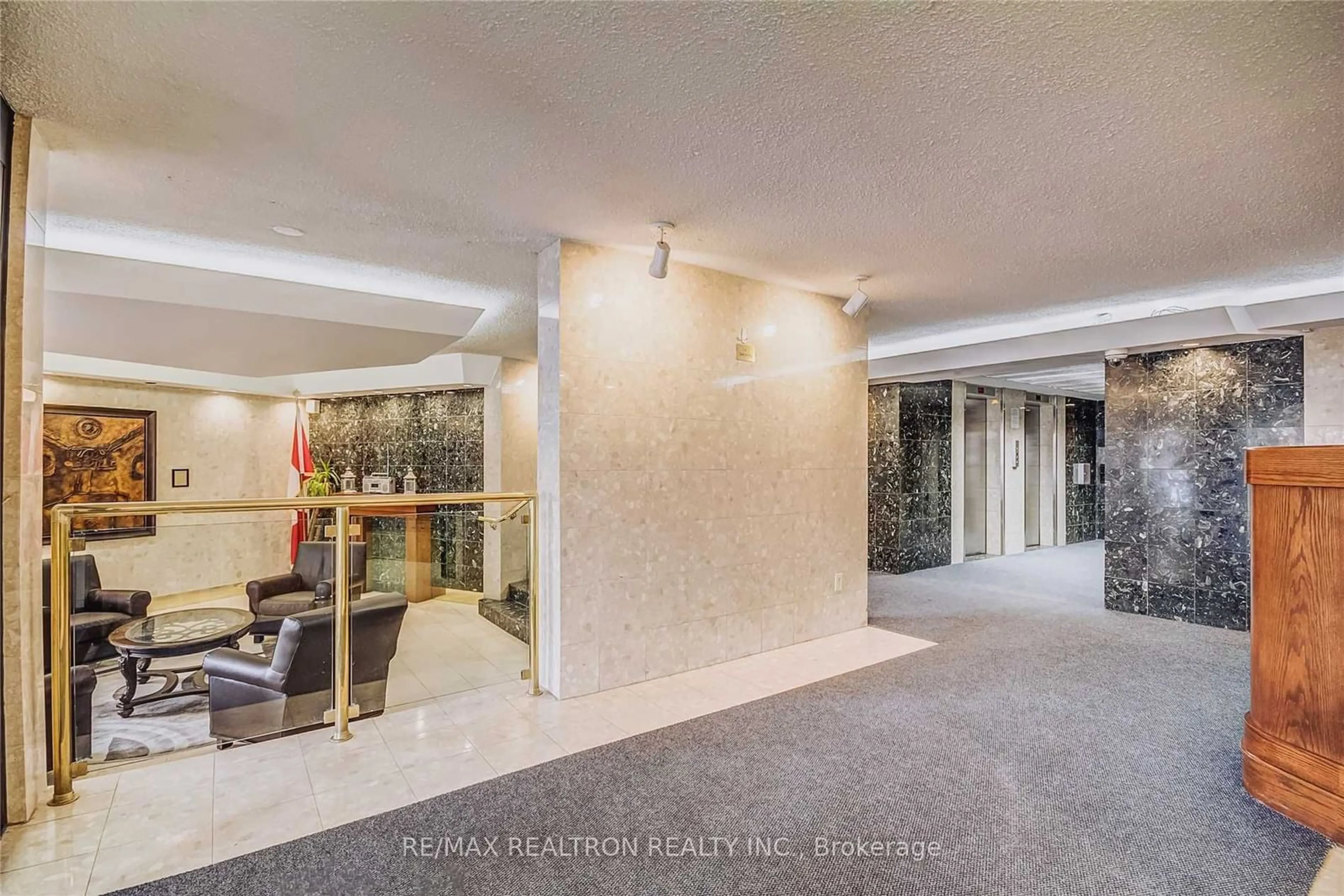 Indoor lobby, cement floor for 60 Pavane Linkway Way #106, Toronto Ontario M3C 1A1