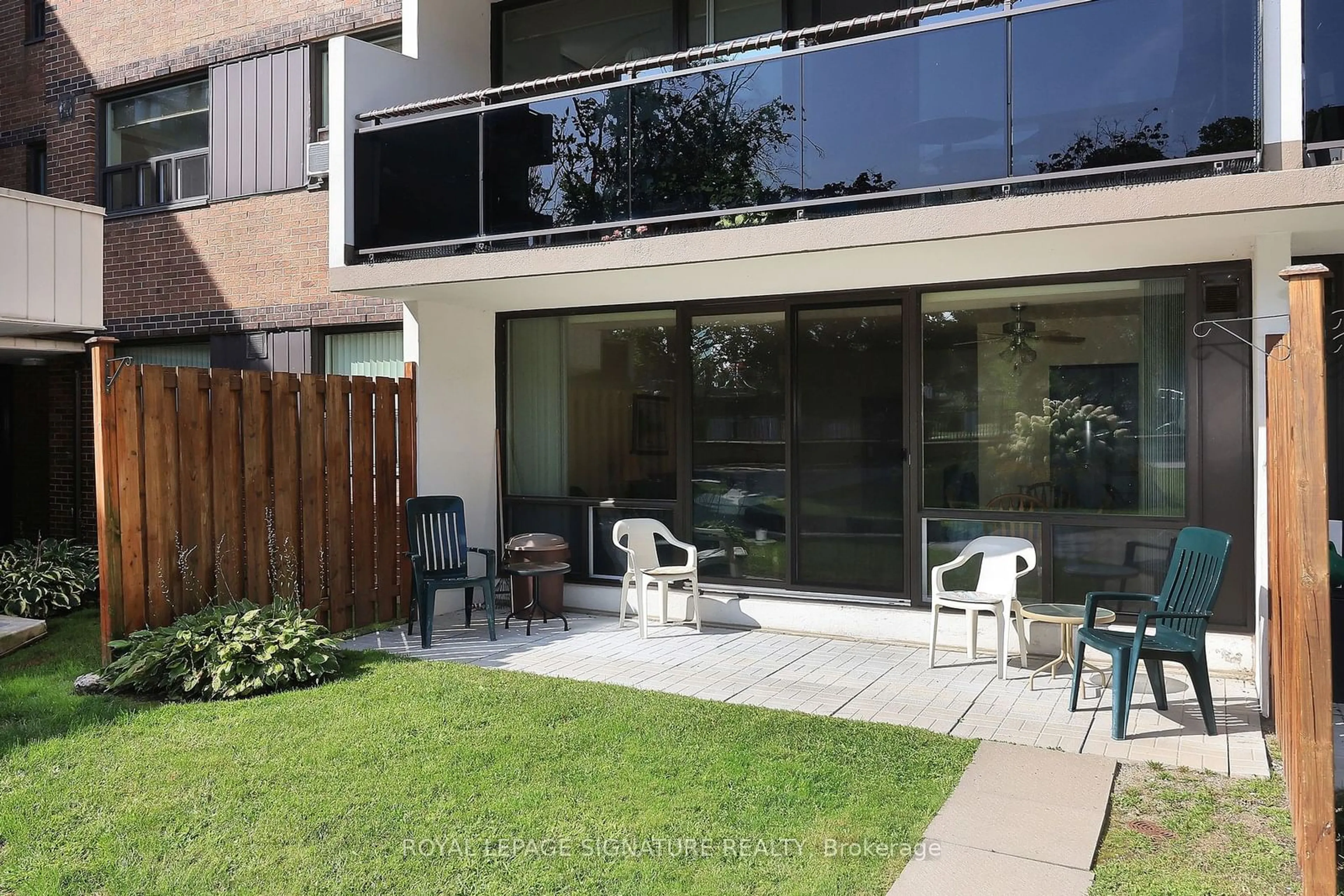 Patio, the front or back of building for 20 Sunrise Ave #114, Toronto Ontario M4A 2R2