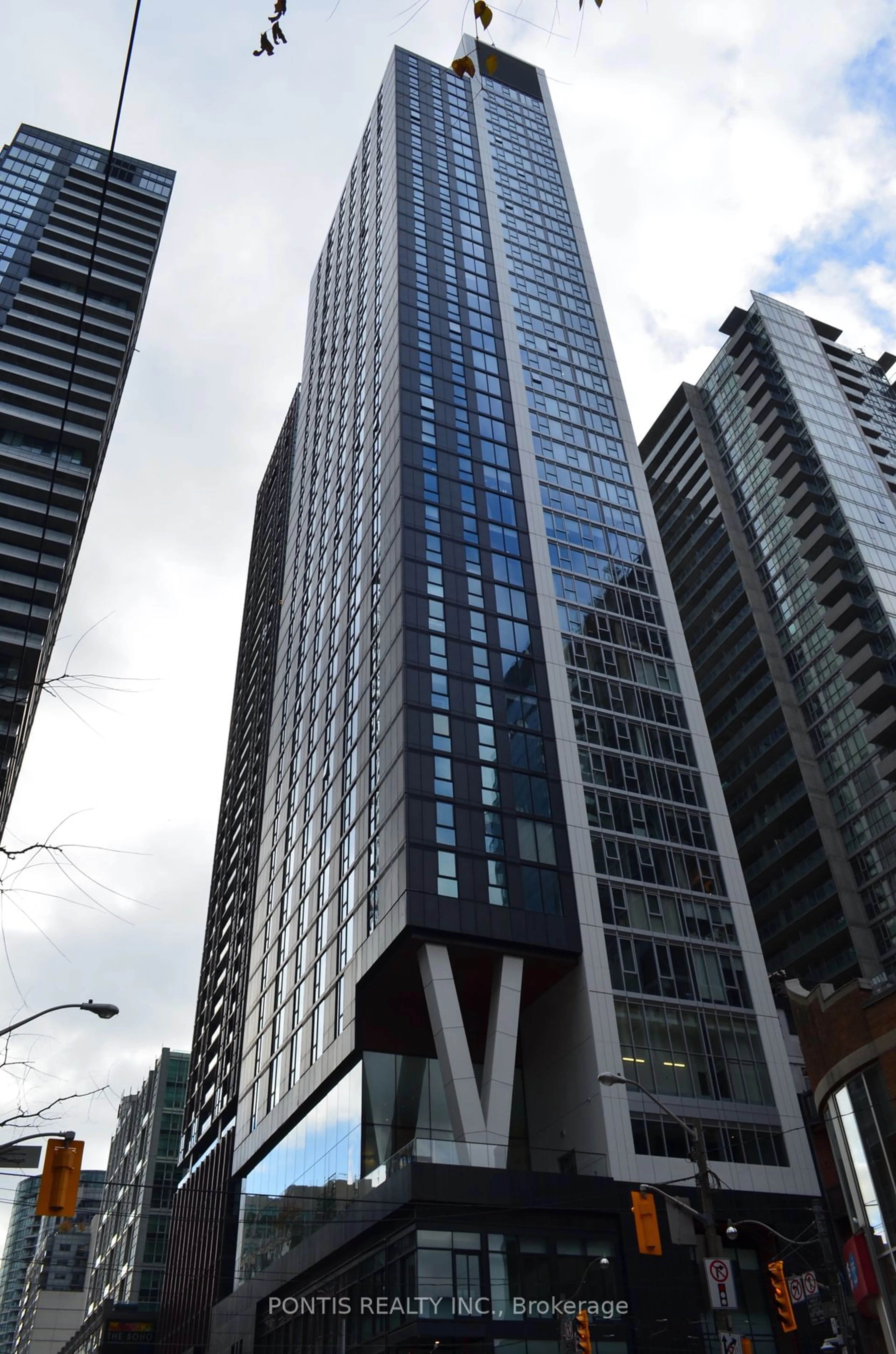 A pic from exterior of the house or condo, the view of city buildings for 357 King St #1204, Toronto Ontario M5V 0S7