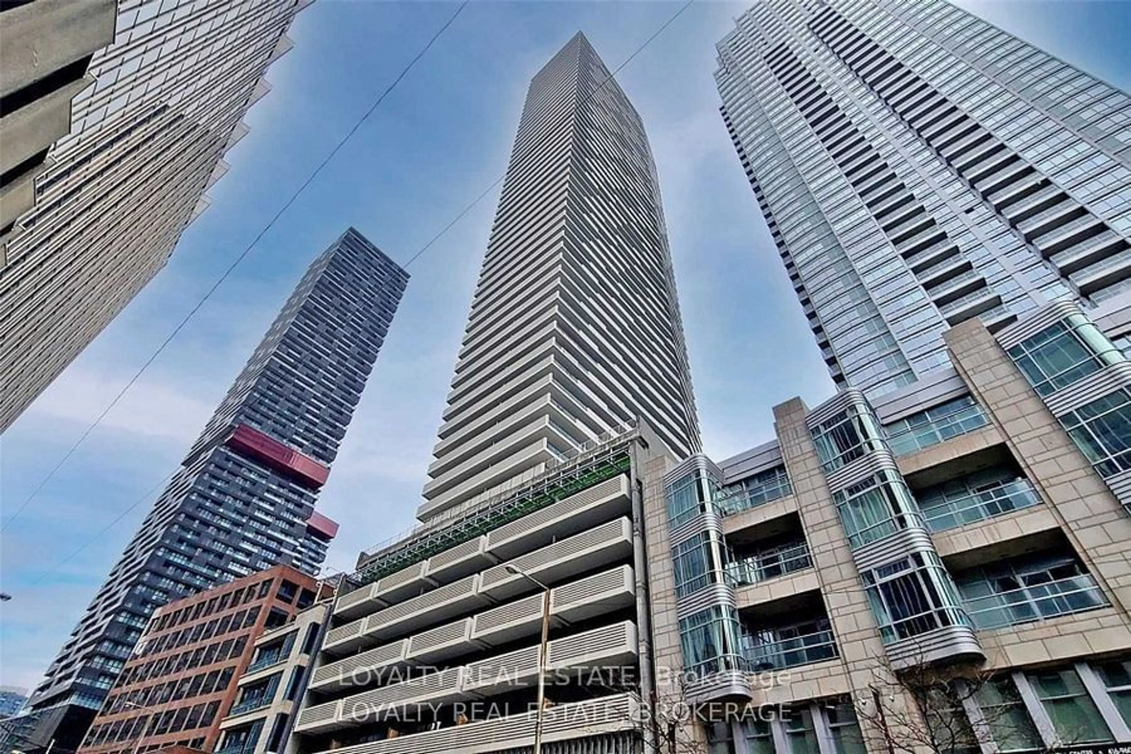 A pic from exterior of the house or condo, the view of city buildings for 2221 Yonge St #2104, Toronto Ontario M4S 0B8