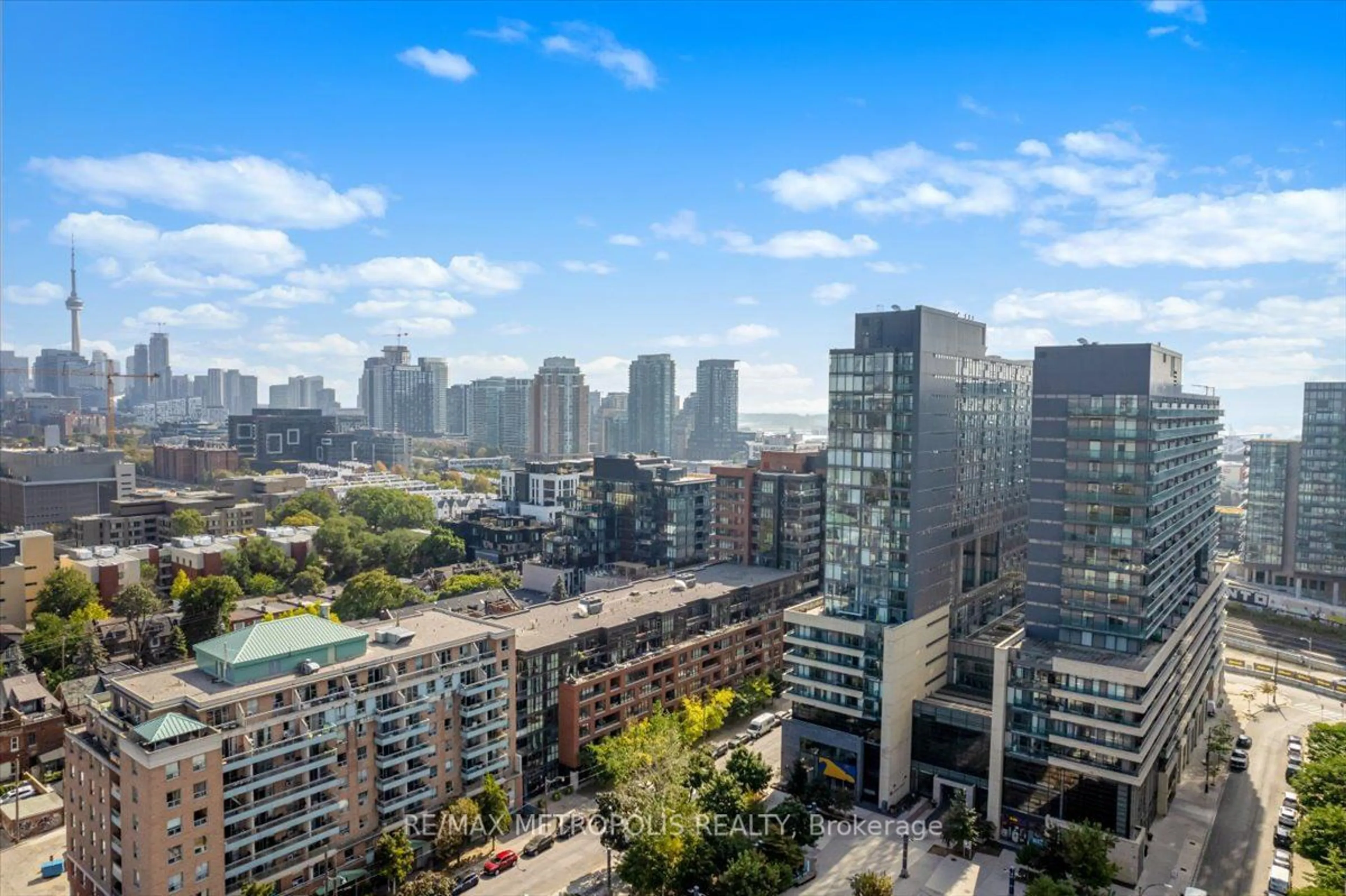 A pic from exterior of the house or condo, the view of city buildings for 36 Lisgar St #906E, Toronto Ontario M6J 0C7