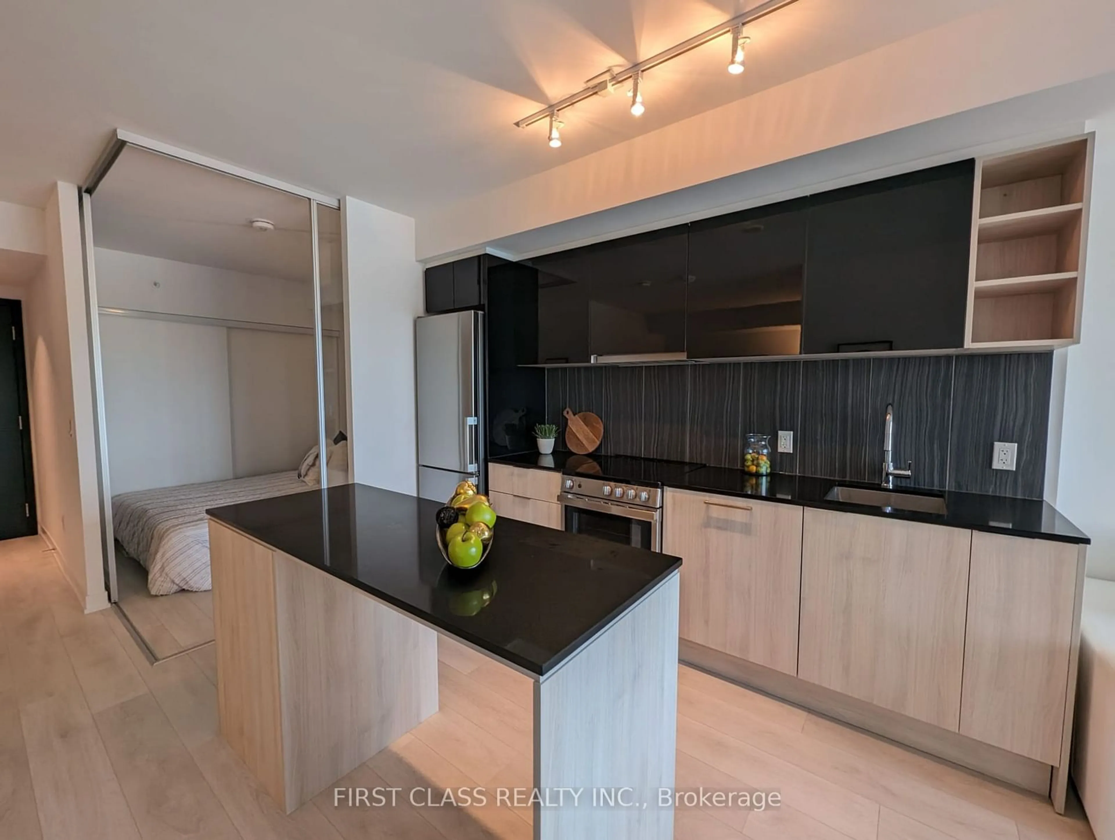 Contemporary kitchen, wood floors for 31 Tippett Rd #411, Toronto Ontario M3H 0C8