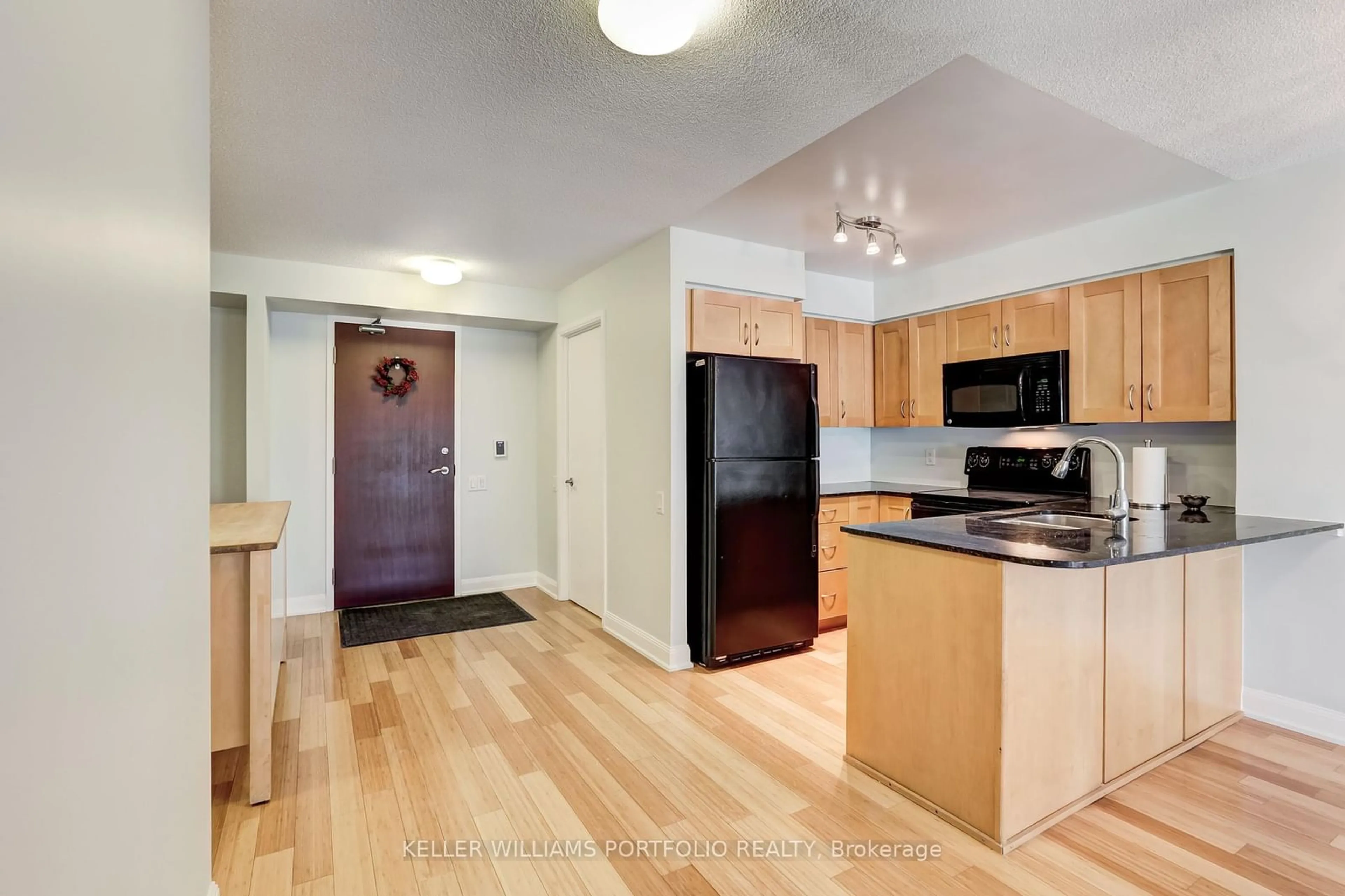 Standard kitchen, wood floors for 2181 Yonge St #709, Toronto Ontario M4S 3H7