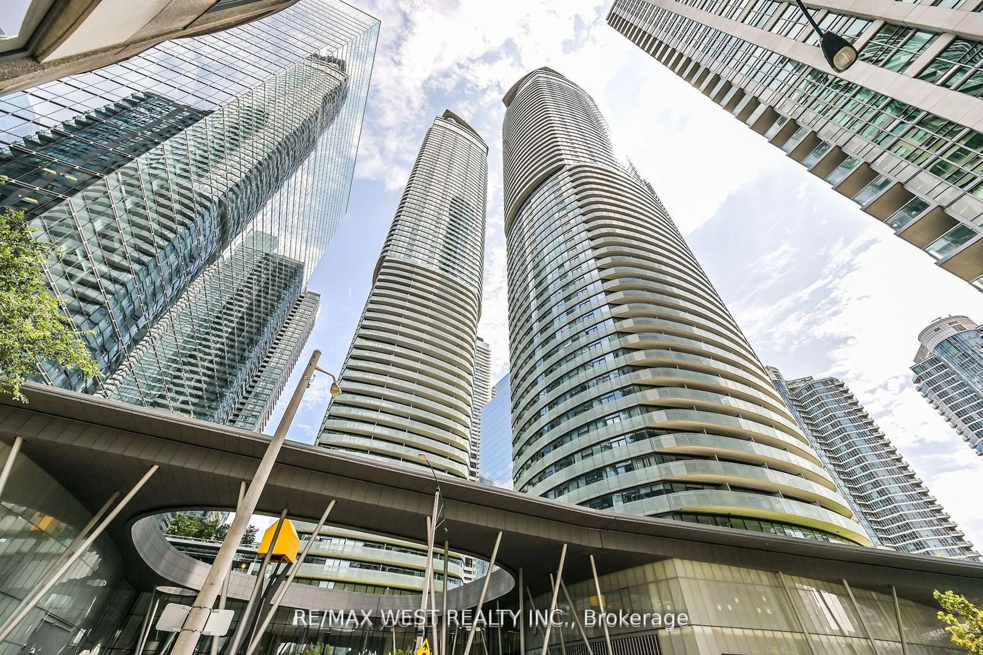 A pic from exterior of the house or condo, the view of city buildings for 14 York St #4707, Toronto Ontario M5J 0B1