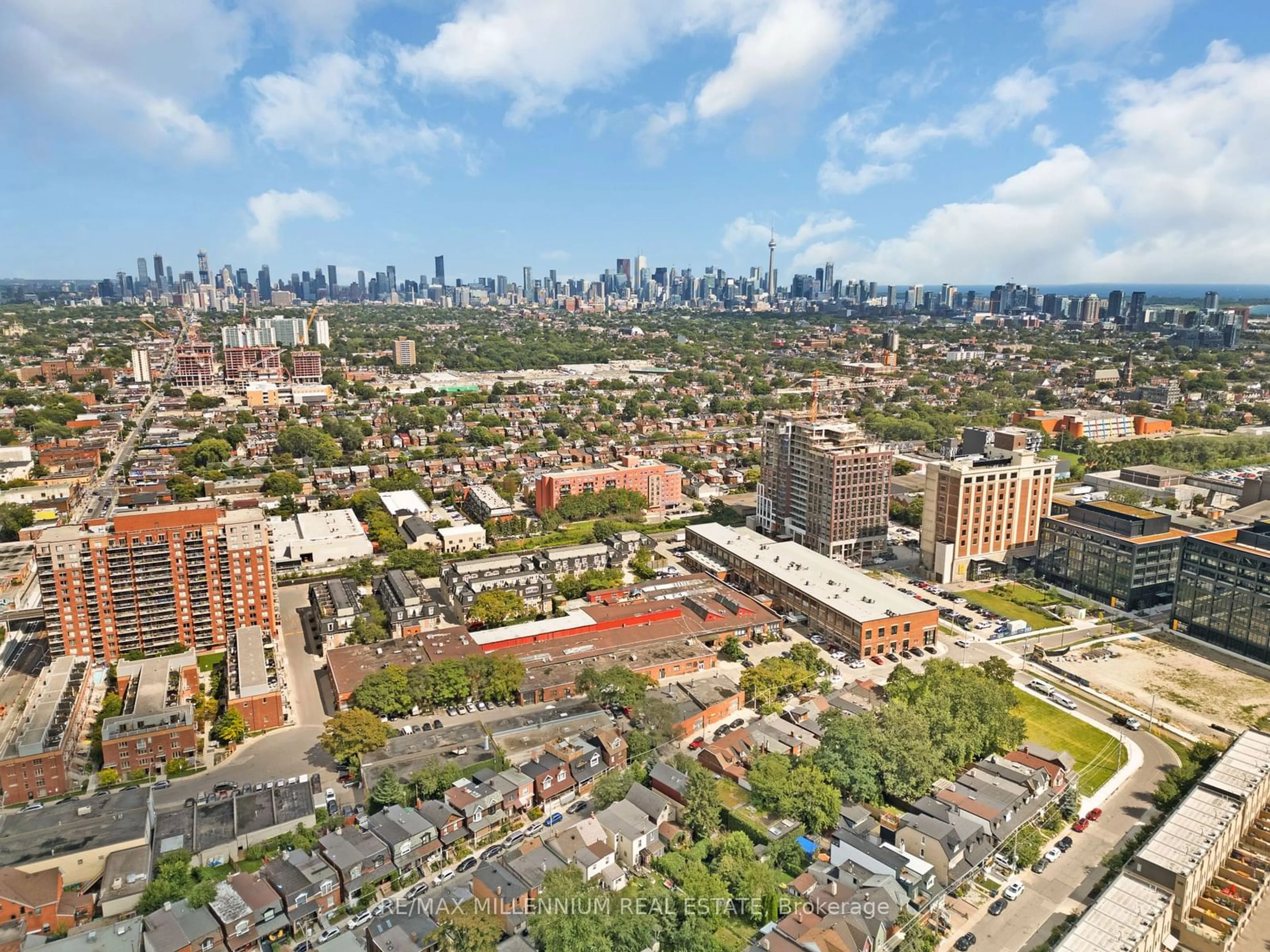 A pic from exterior of the house or condo, the view of city buildings for 250 Sterling Rd, Toronto Ontario M6R 2B9