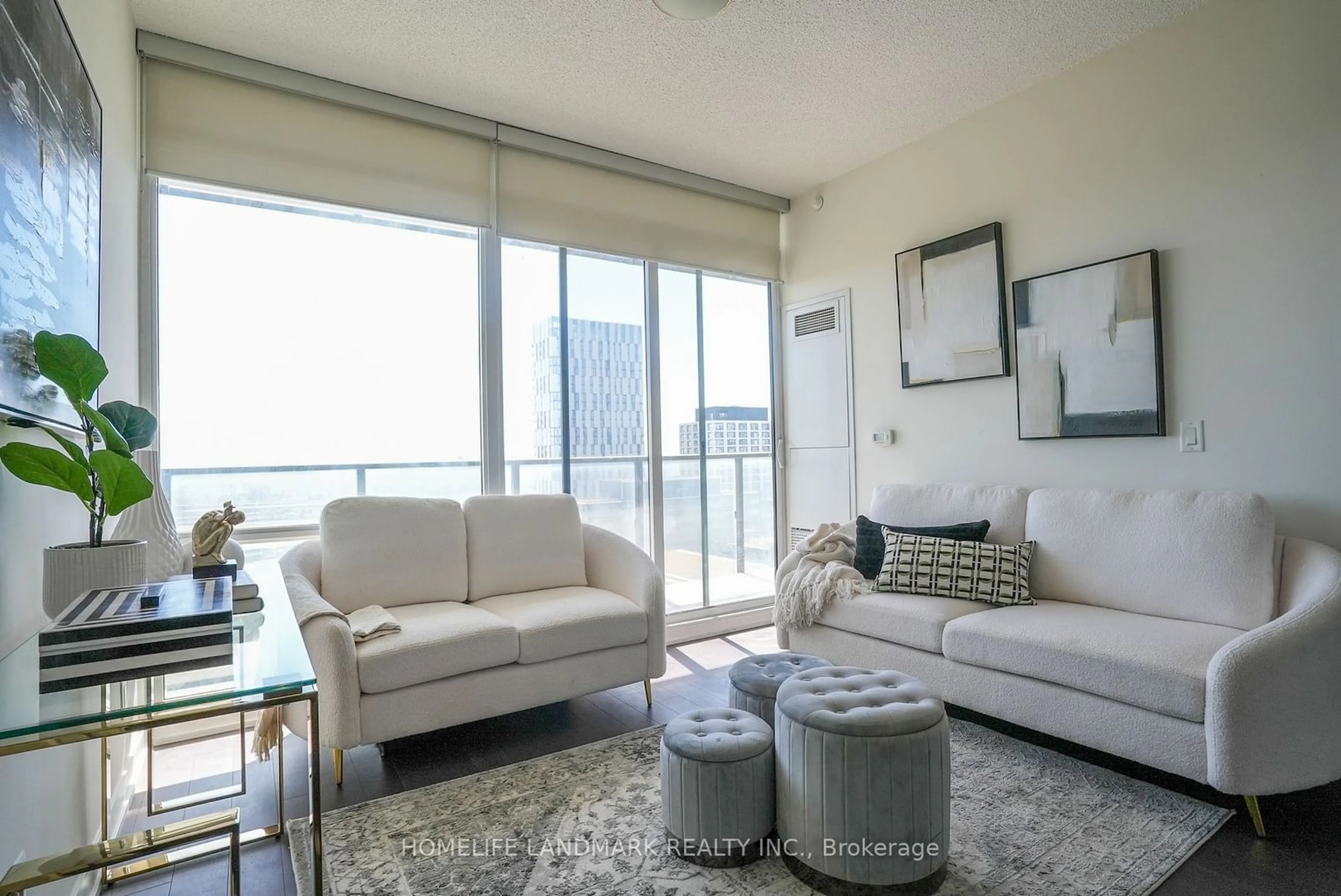 Living room, carpet floors for 120 Bayview Ave #S1204, Toronto Ontario M5A 0G4