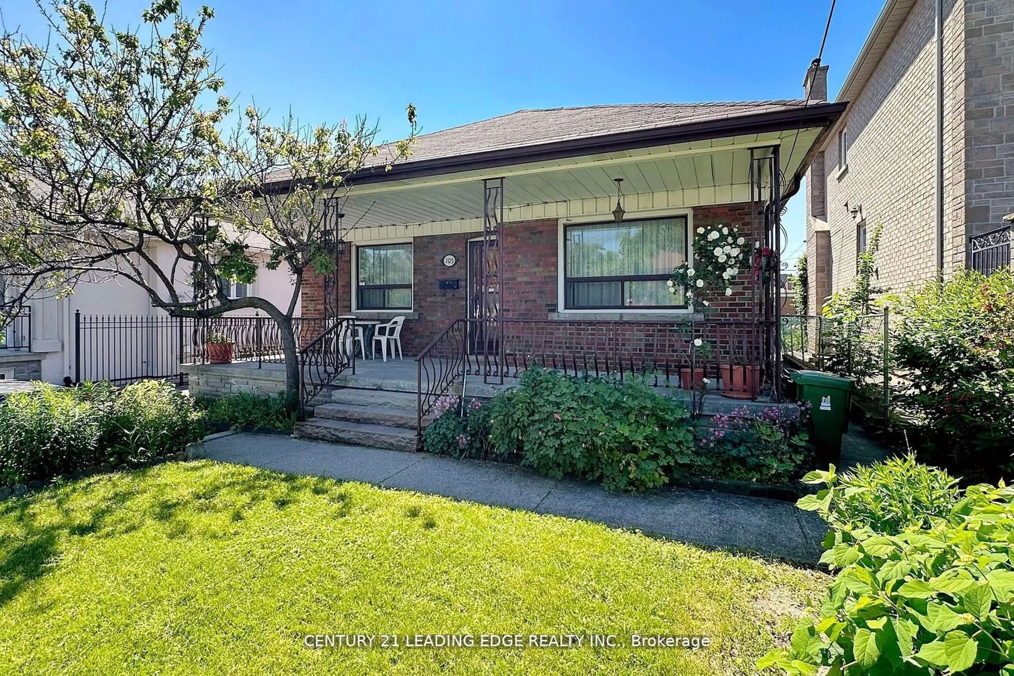 Frontside or backside of a home, the fenced backyard for 105 Regina Ave, Toronto Ontario M6A 1R5