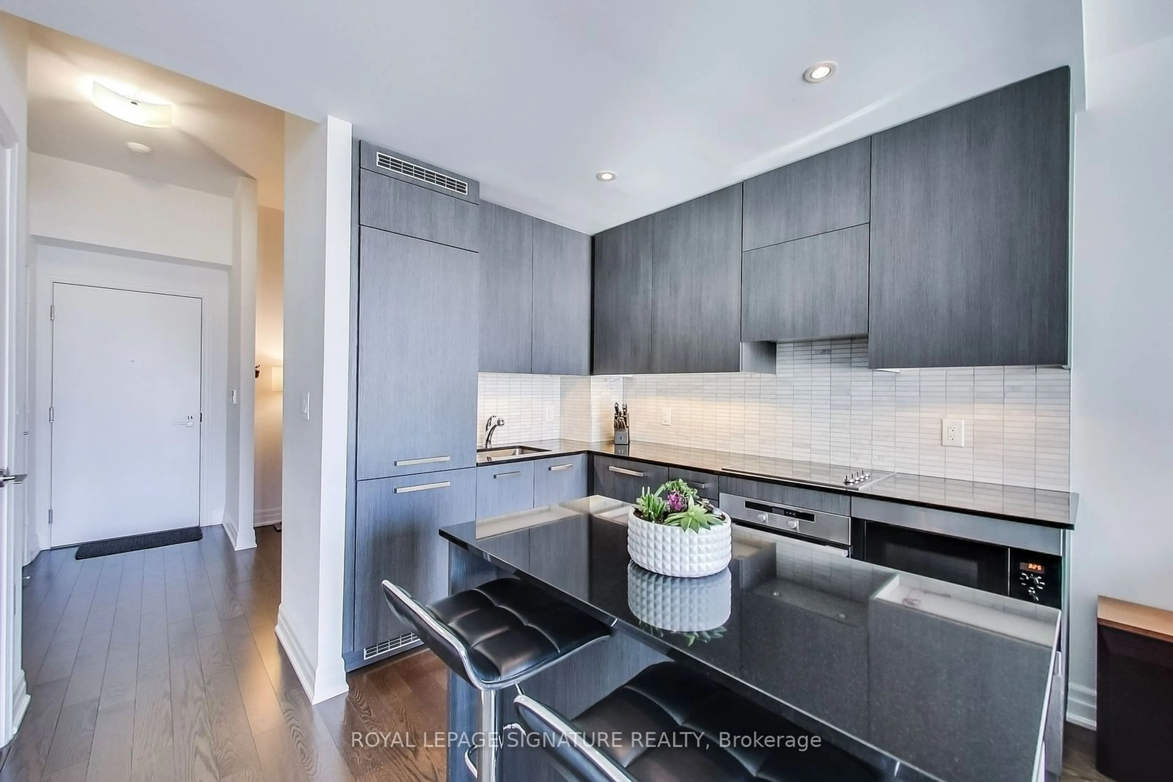 Contemporary kitchen, wood floors for 8 The Esplanade #1104, Toronto Ontario M5E 0A6