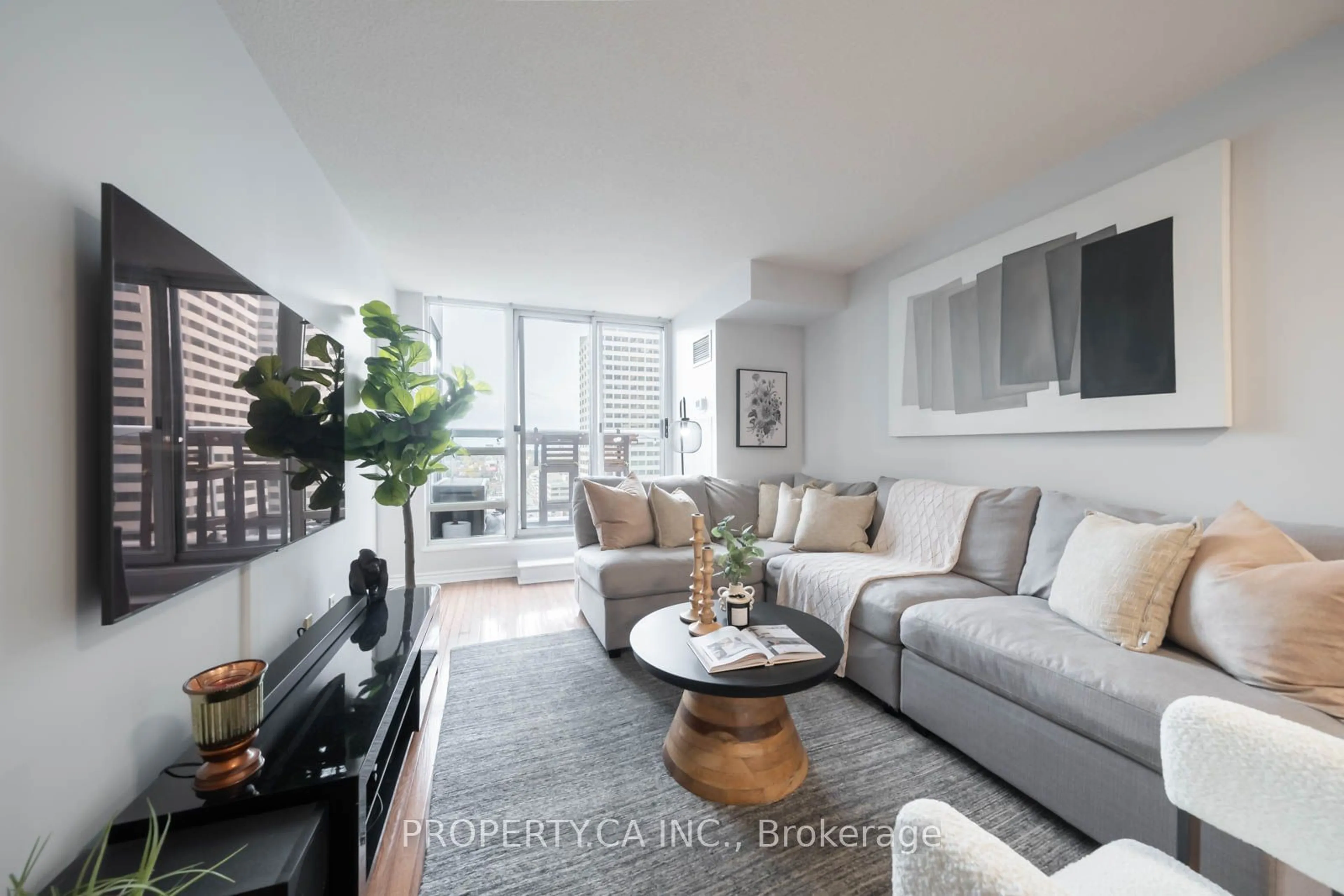 Living room, wood floors for 43 Eglinton Ave #1902, Toronto Ontario M4P 1A2