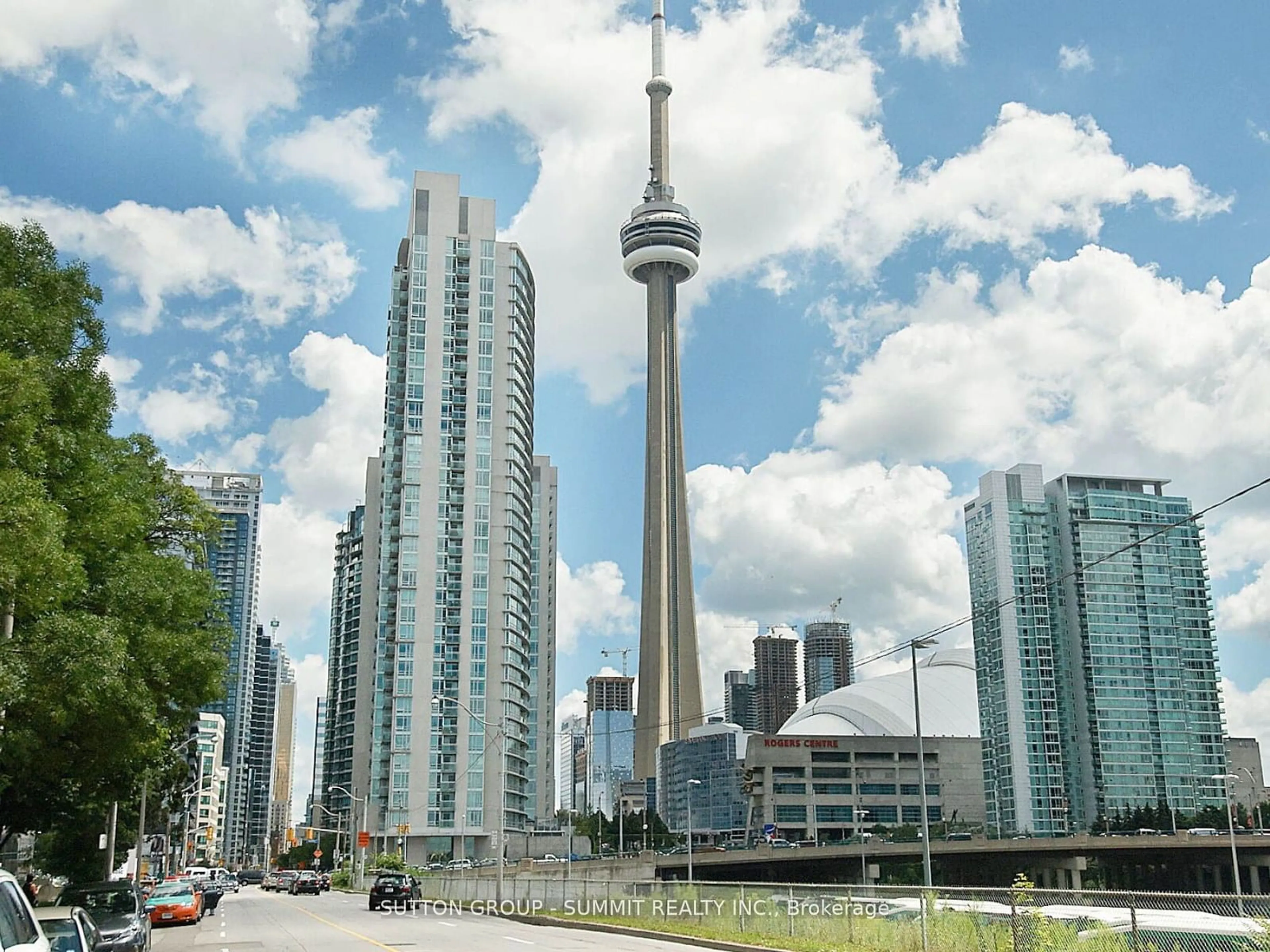 A pic from exterior of the house or condo, the view of city buildings for 397 Front St #209, Toronto Ontario M5V 3S1