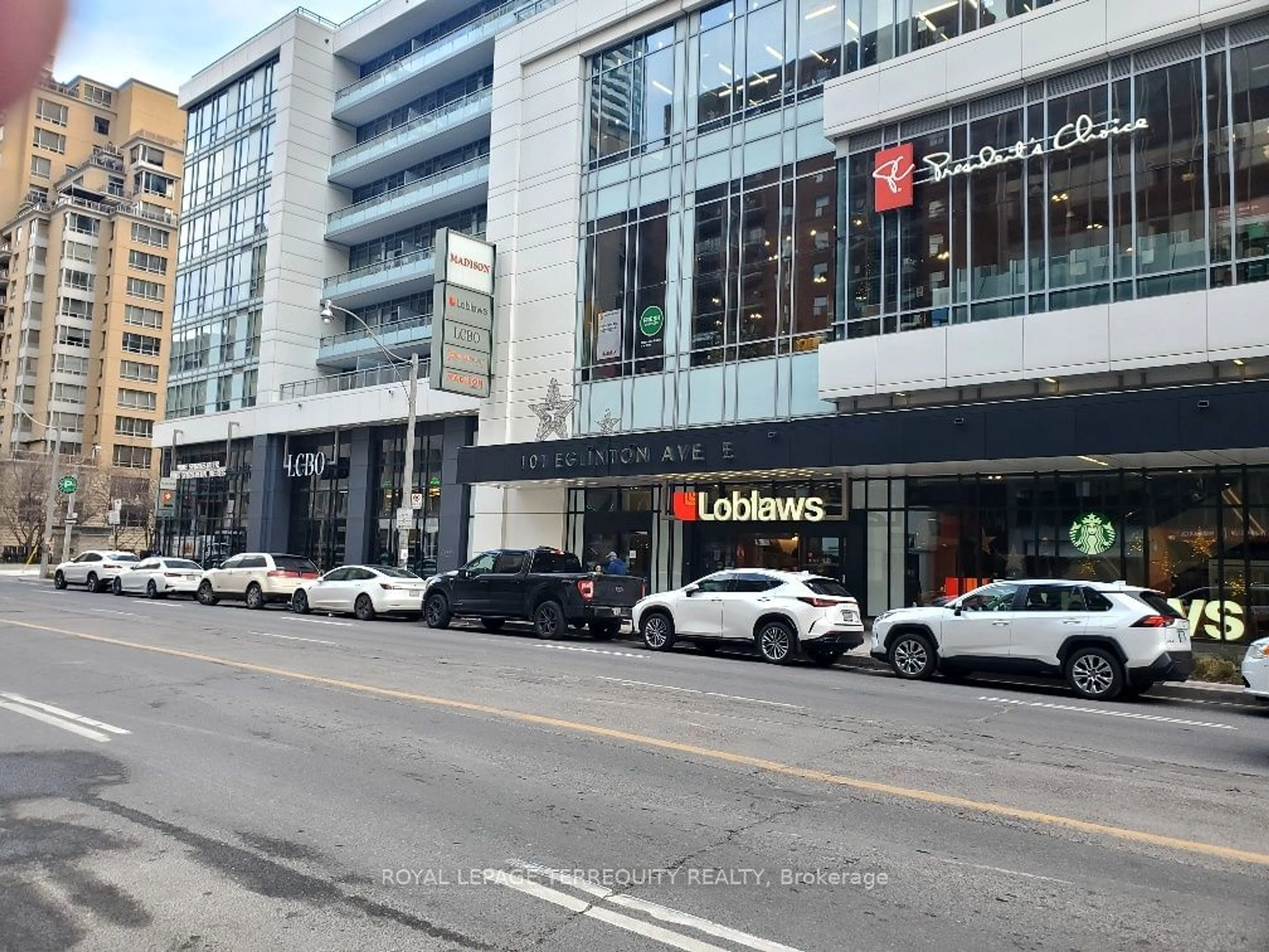 A pic from exterior of the house or condo, the street view for 98 Lillian St #210, Toronto Ontario M4S 0A5