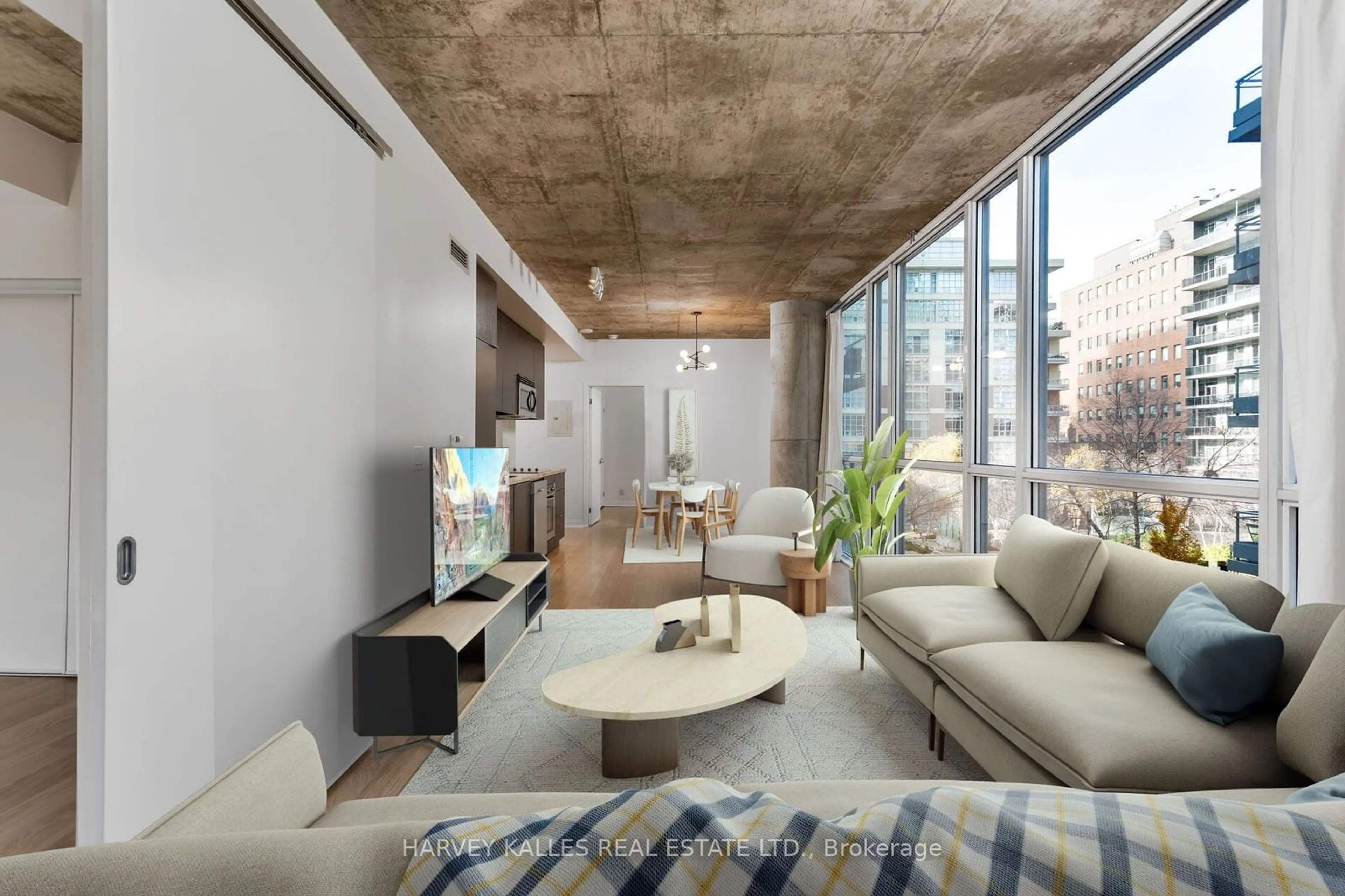 Living room, cement floor for 478 King St #301, Toronto Ontario M5V 0A8