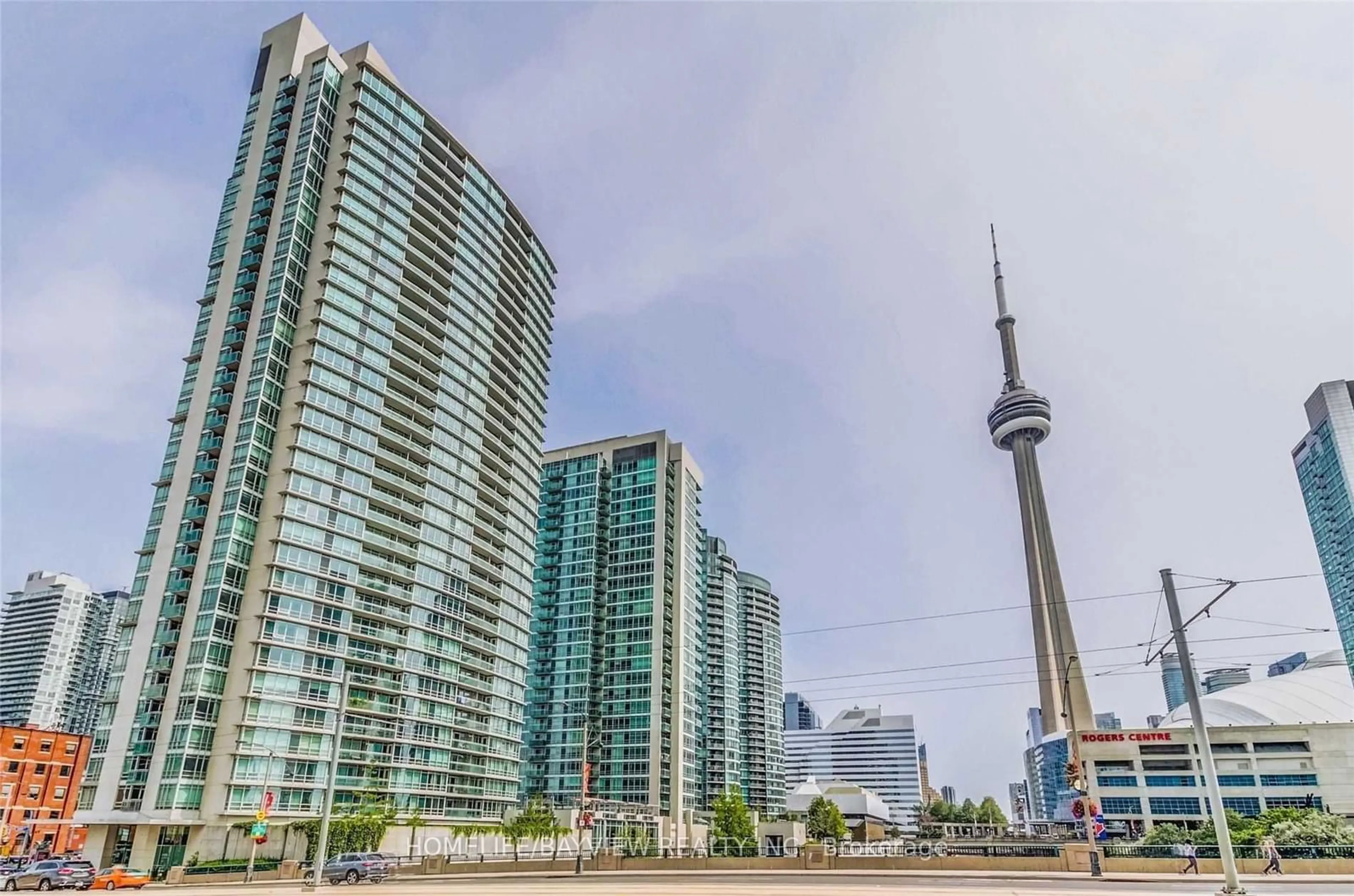 A pic from exterior of the house or condo, the view of city buildings for 397 Front St #316, Toronto Ontario M5V 3S1