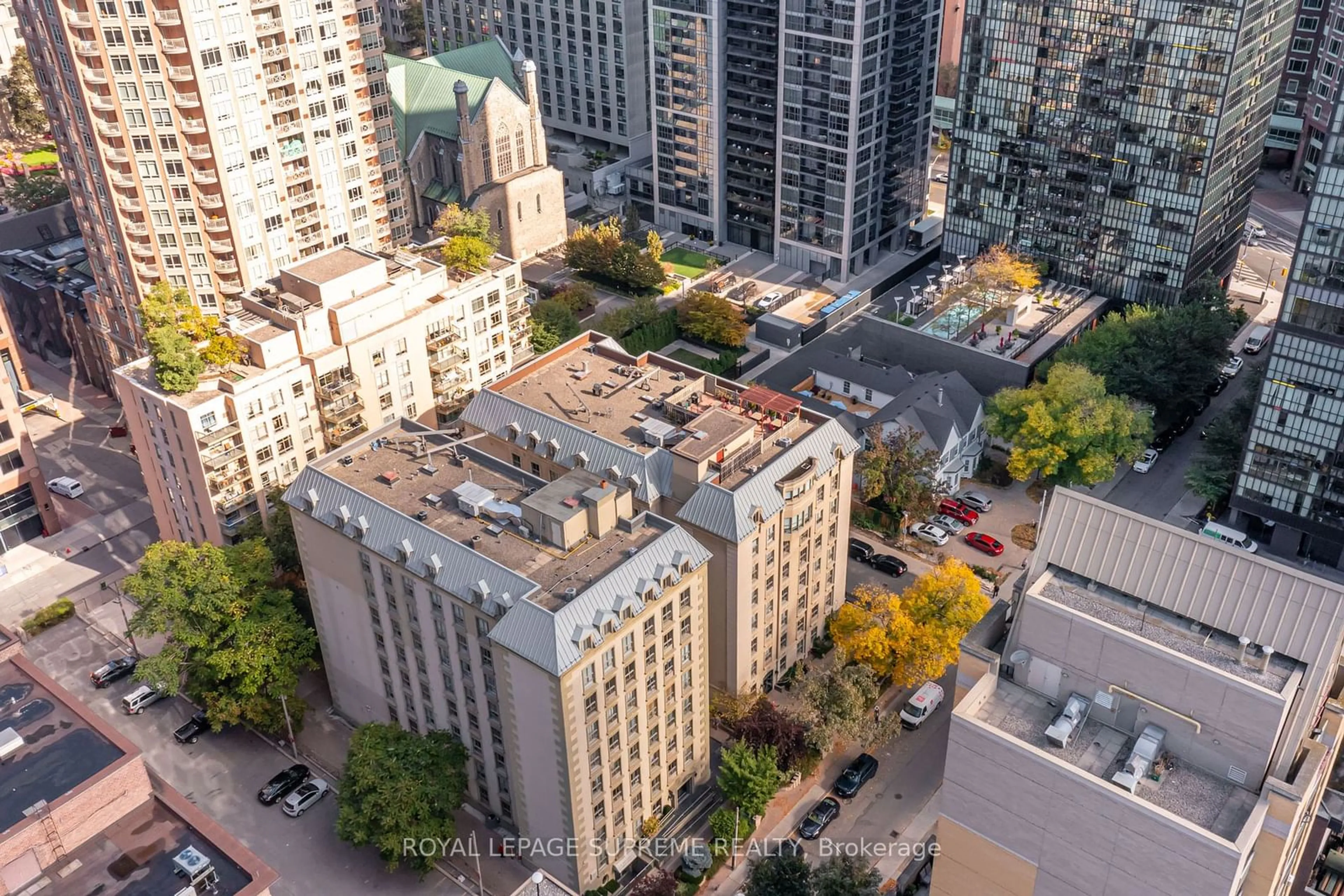 A pic from exterior of the house or condo, the view of city buildings for 80 Charles St #607, Toronto Ontario M4Y 2W6