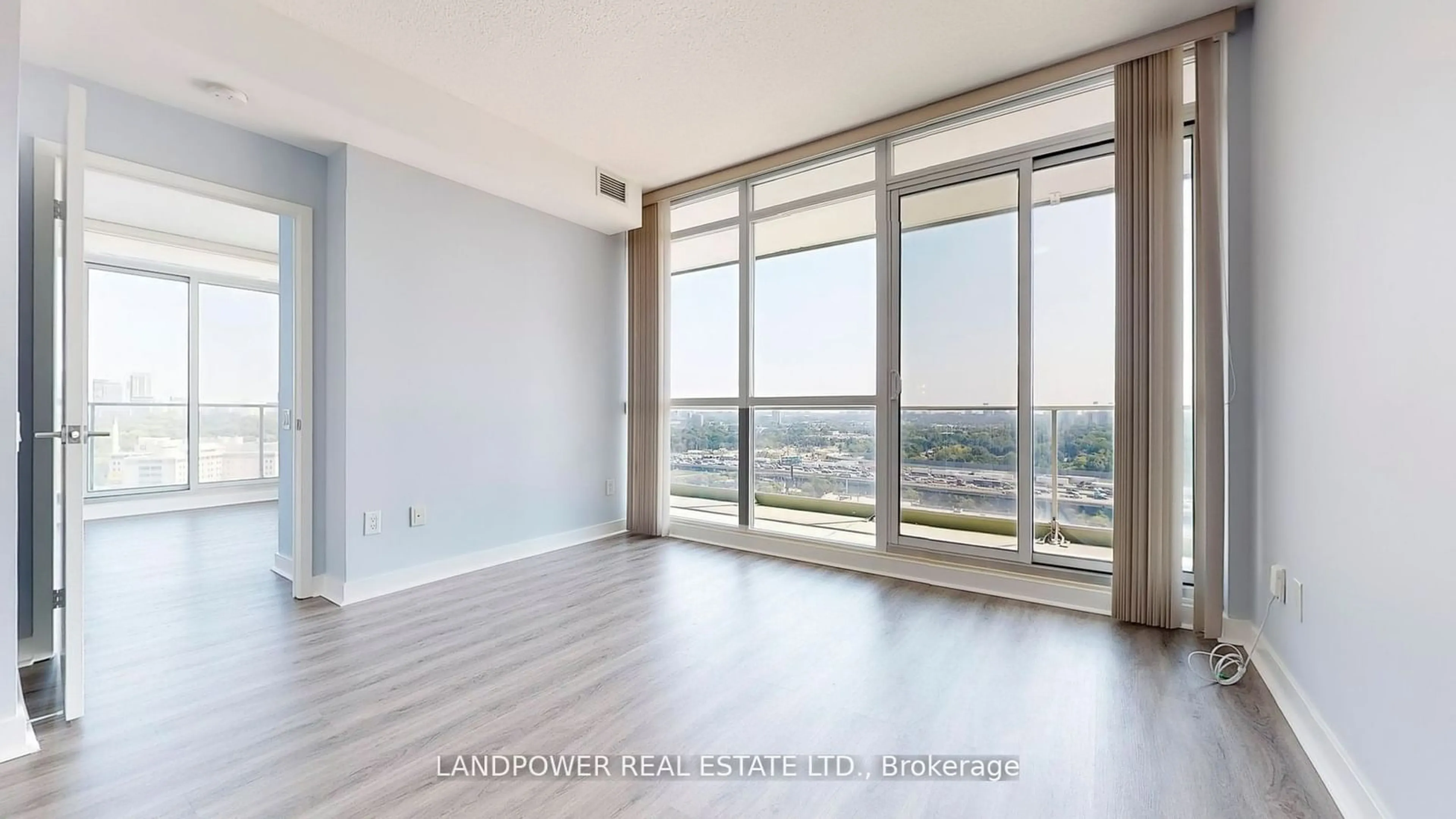 A pic of a room, wood floors for 29 Singer Crt #2011, Toronto Ontario M2K 0B3