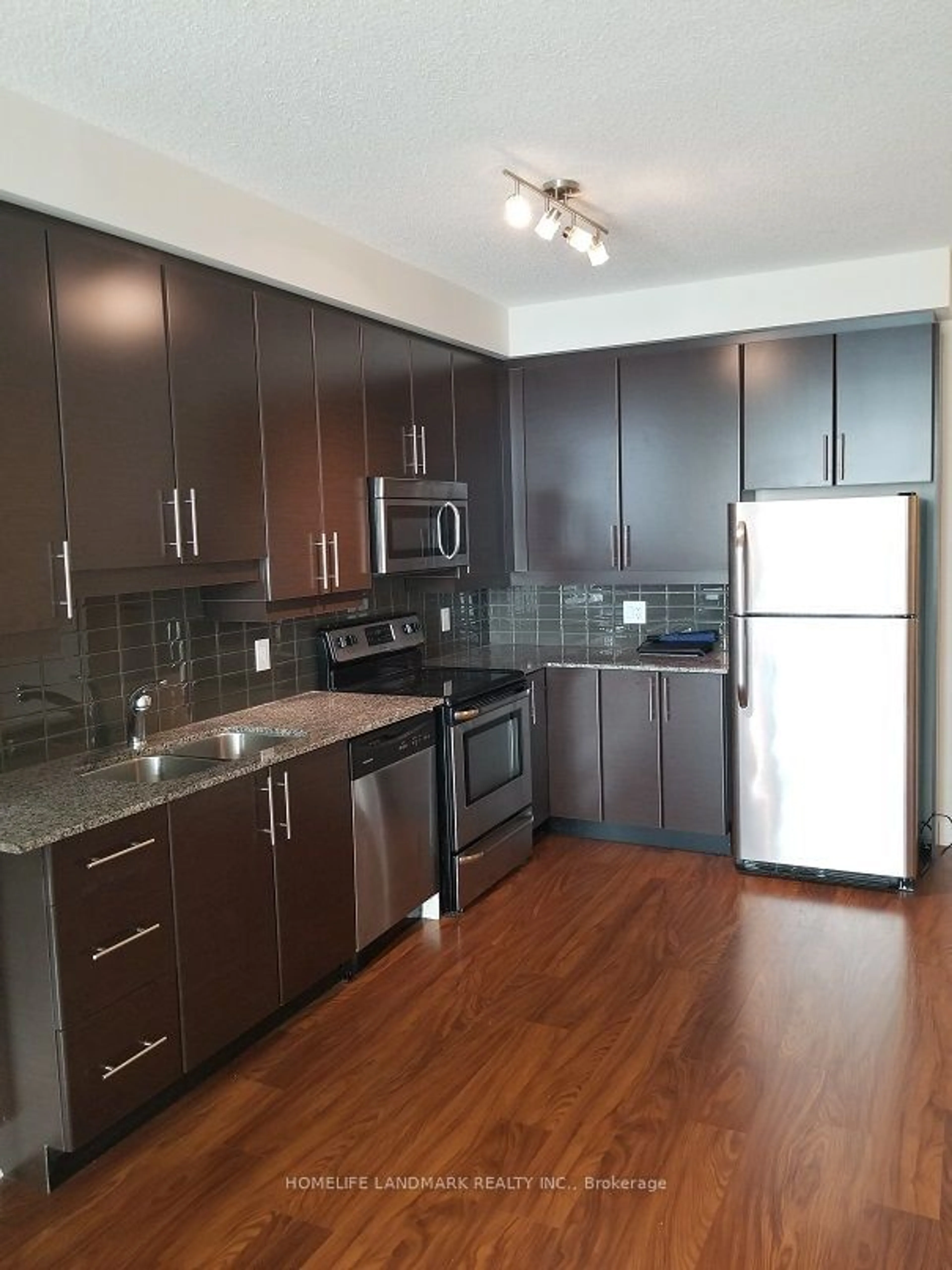 Standard kitchen, wood floors for 33 Bay St #3813, Toronto Ontario M5J 2Z3