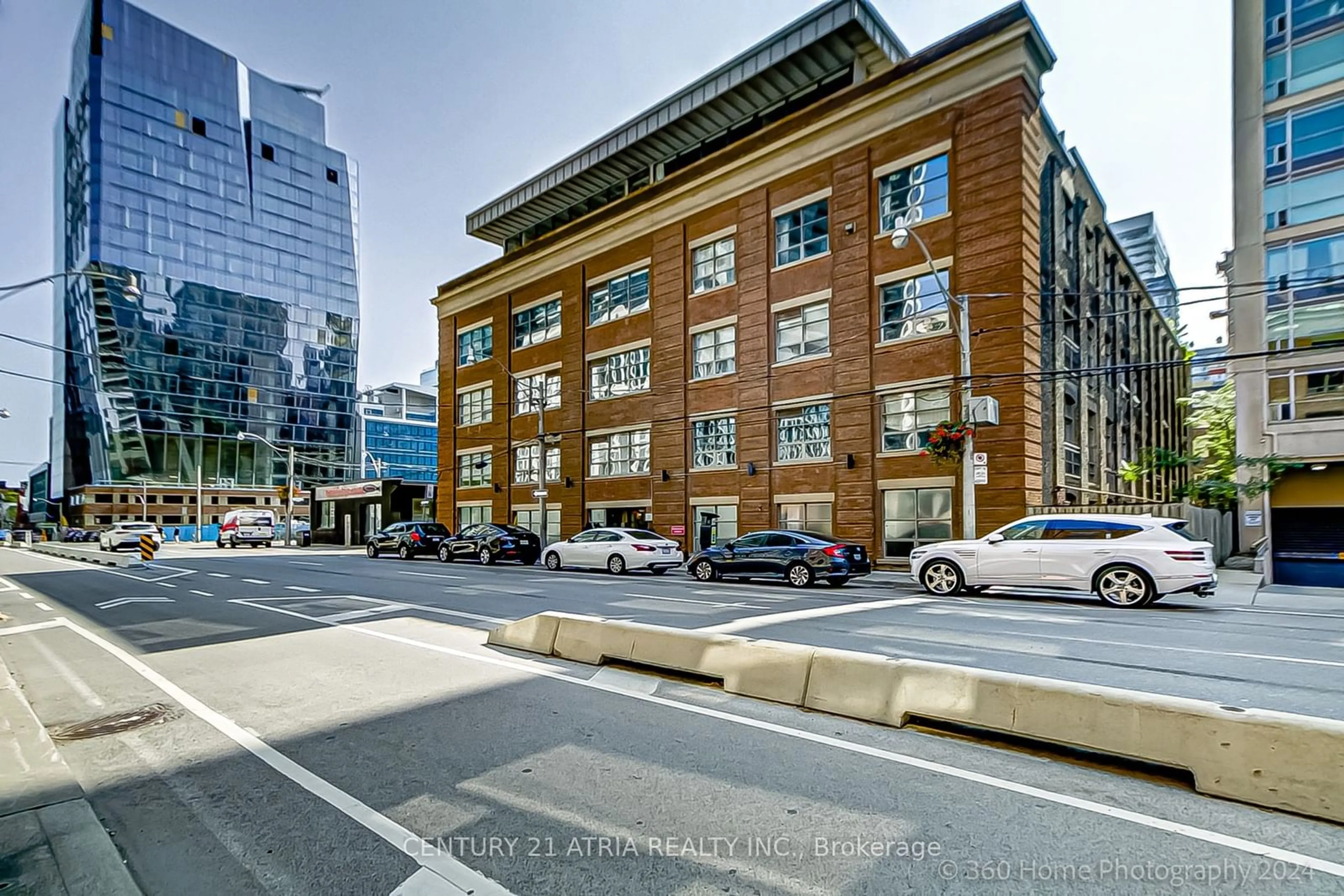 A pic from exterior of the house or condo, the street view for 383 Adelaide St #313, Toronto Ontario M5A 1N3