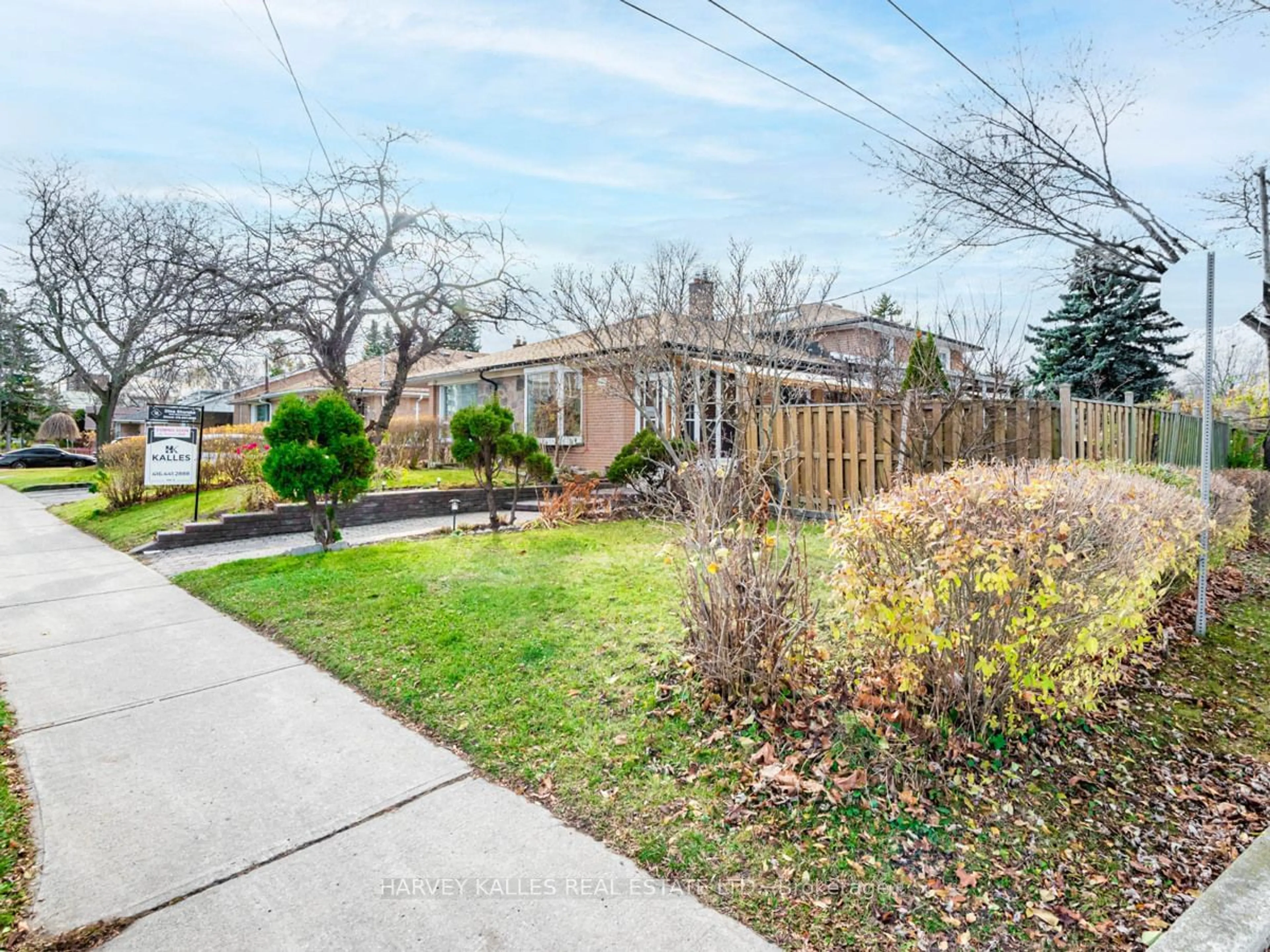 A pic from exterior of the house or condo, the fenced backyard for 100 Fenside Dr, Toronto Ontario M3A 2V6