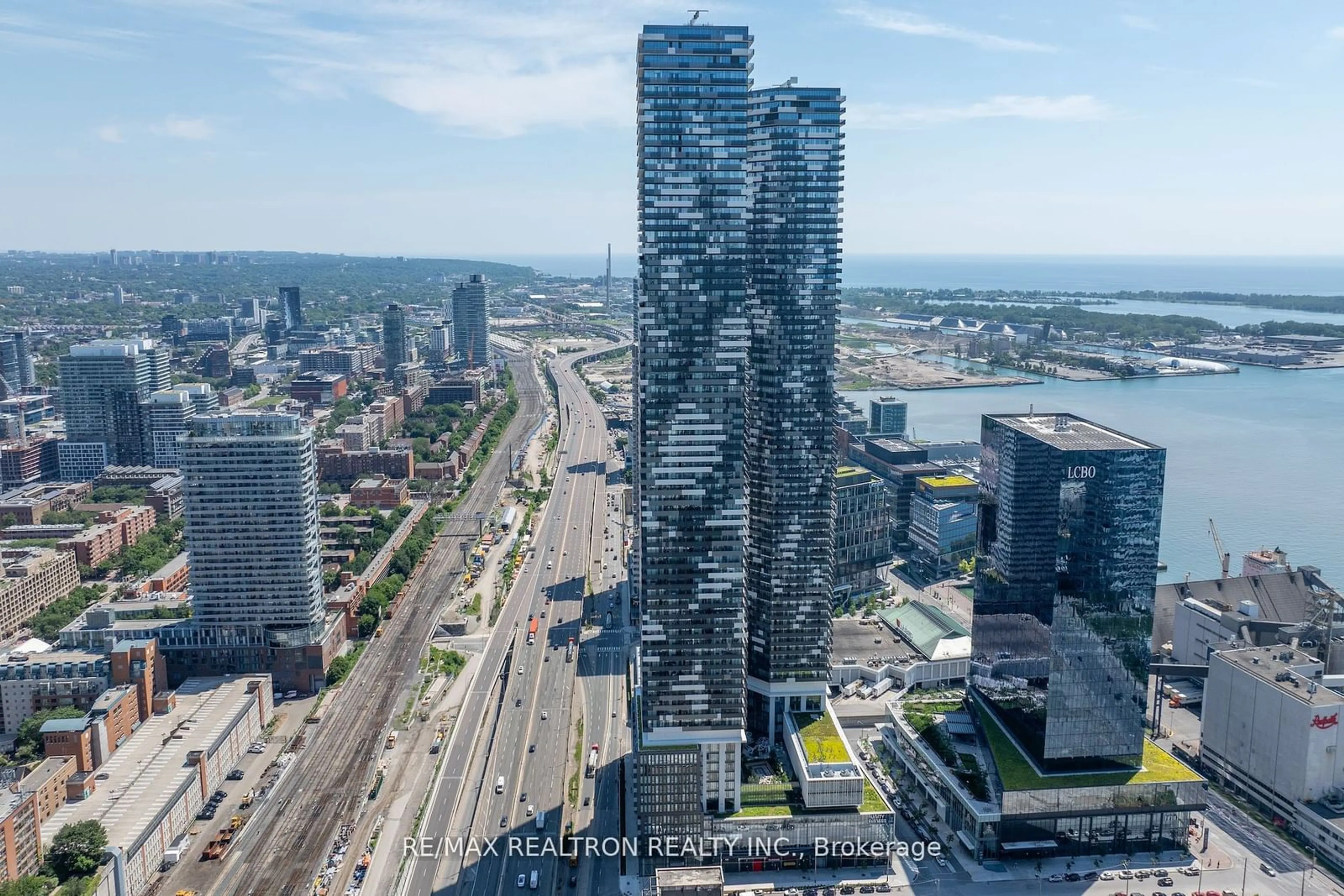 A pic from exterior of the house or condo, the view of city buildings for 55 Cooper St #1905, Toronto Ontario M5E 0G1