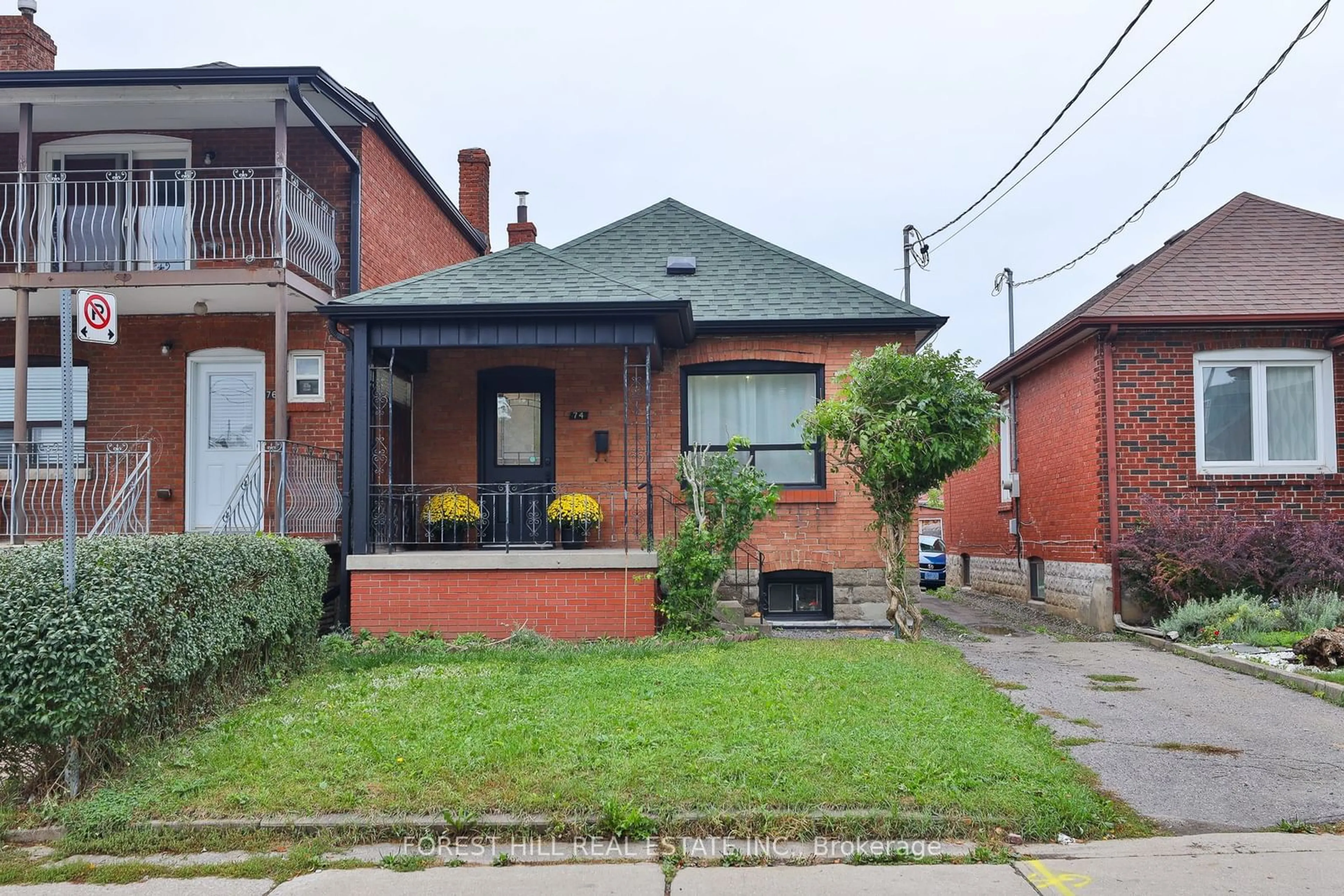 Frontside or backside of a home, cottage for 74 Amherst Ave, Toronto Ontario M6E 1Z4