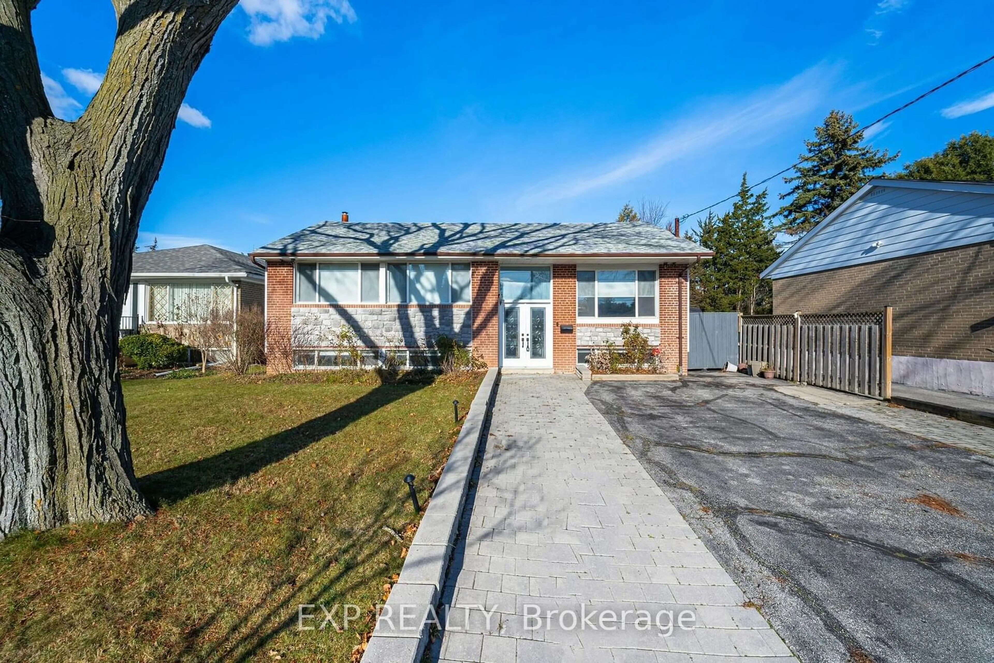 Frontside or backside of a home, the fenced backyard for 108 Lynedock Cres, Toronto Ontario M3A 2B1