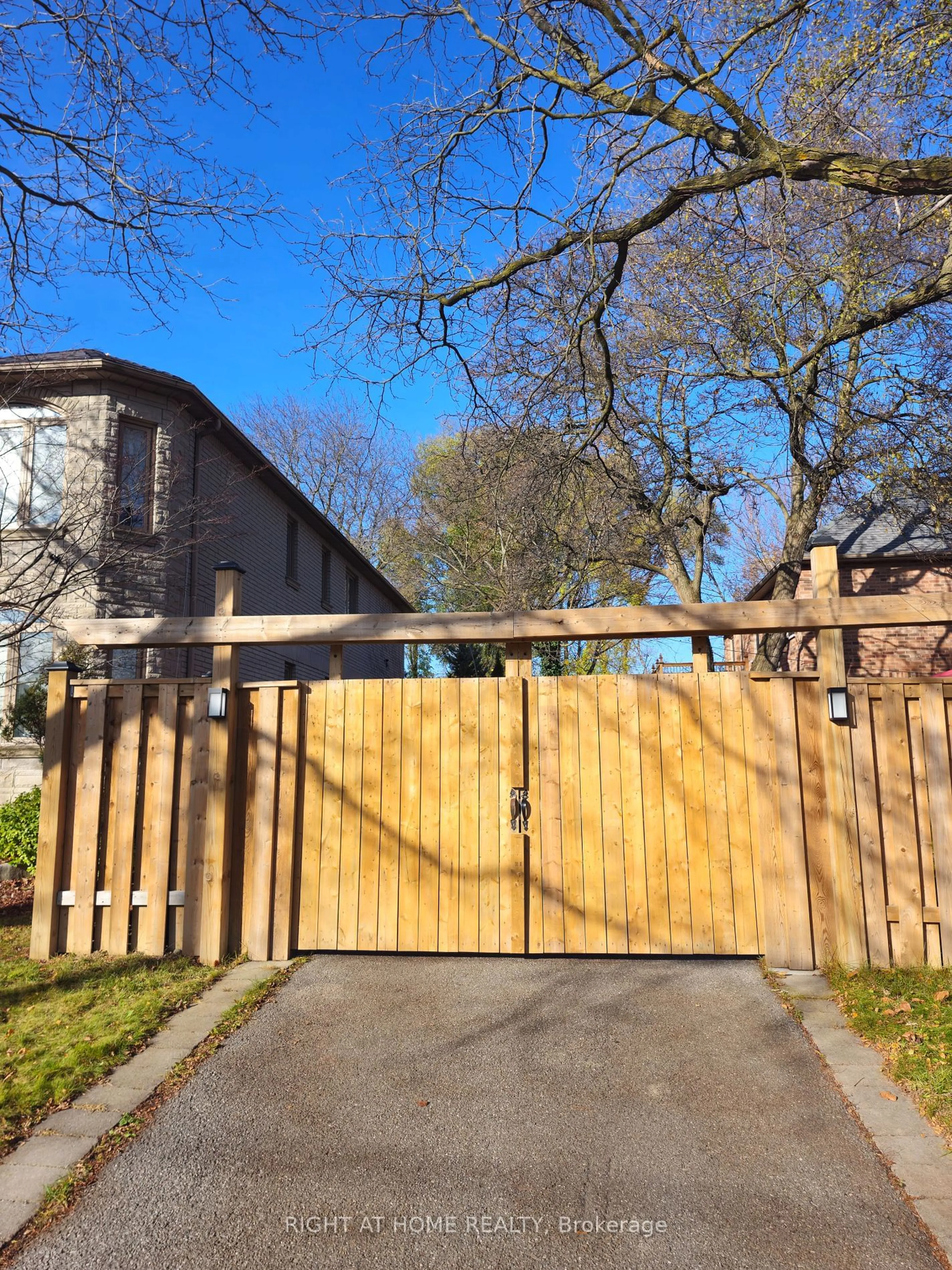 Frontside or backside of a home, the fenced backyard for 310 Senlac Rd, Toronto Ontario M2R 1R1