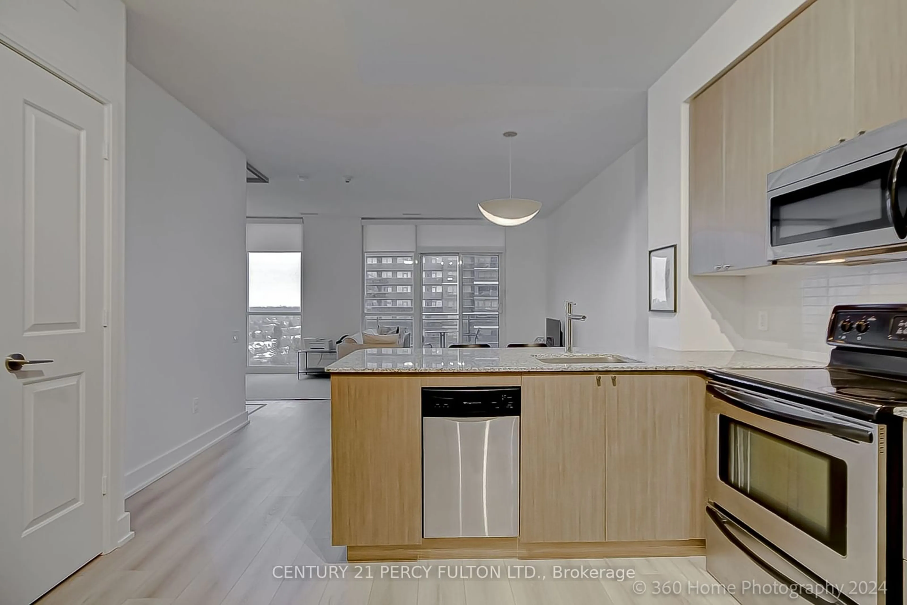 Open concept kitchen for 23 Sheppard Ave #2011, Toronto Ontario M2N 0C8