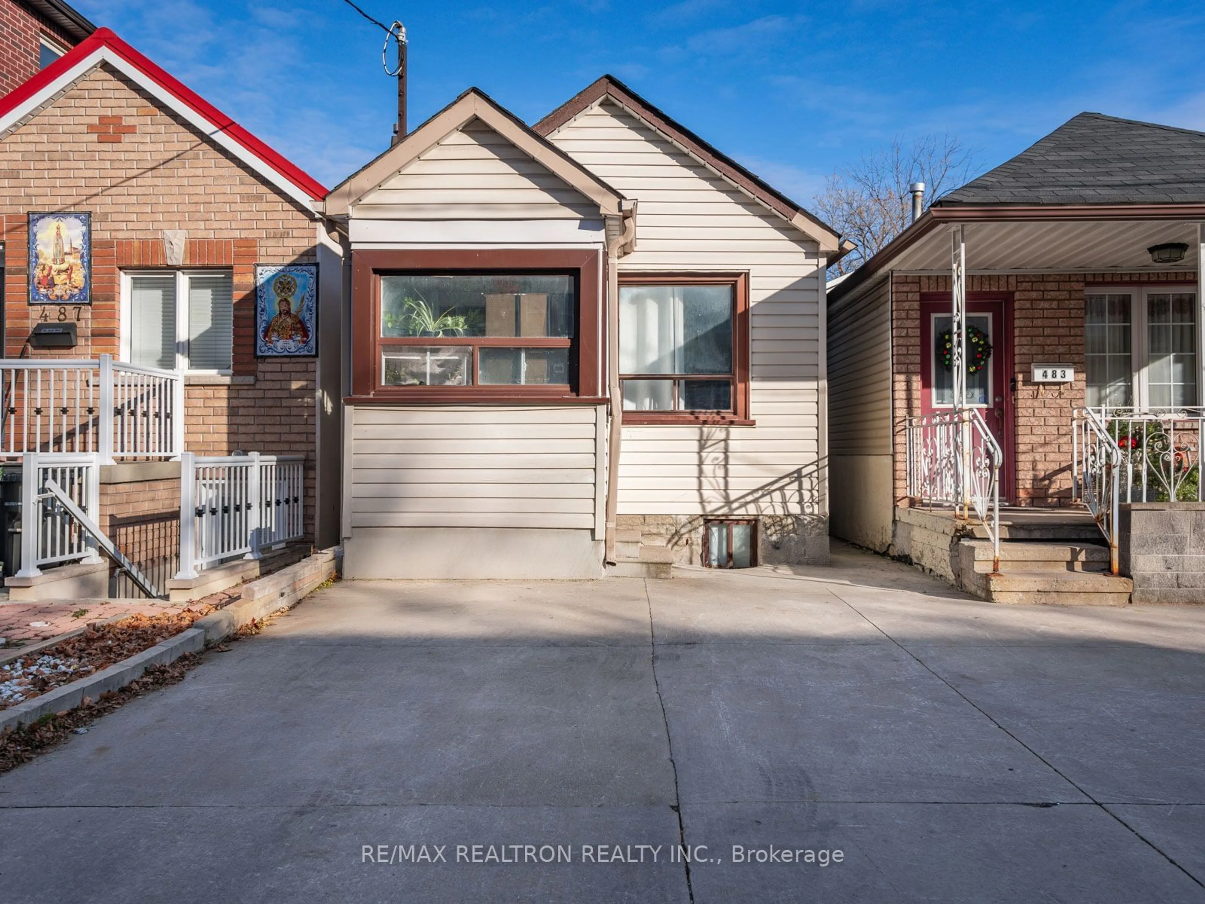 Frontside or backside of a home, the street view for 485 Winona Dr, Toronto Ontario M6C 3V2