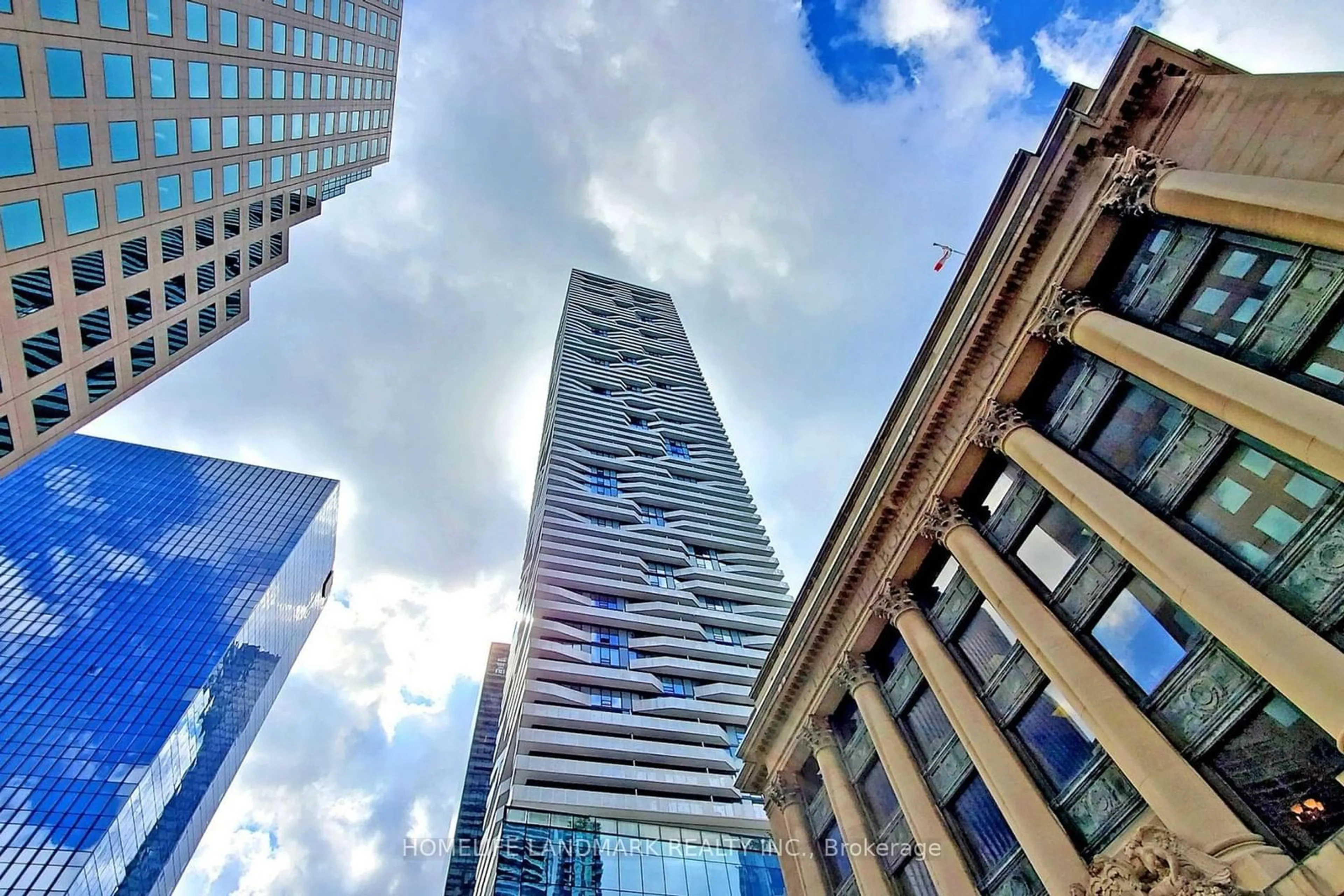 A pic from exterior of the house or condo, the view of city buildings for 88 Harbour St #4107, Toronto Ontario M5J 1B7