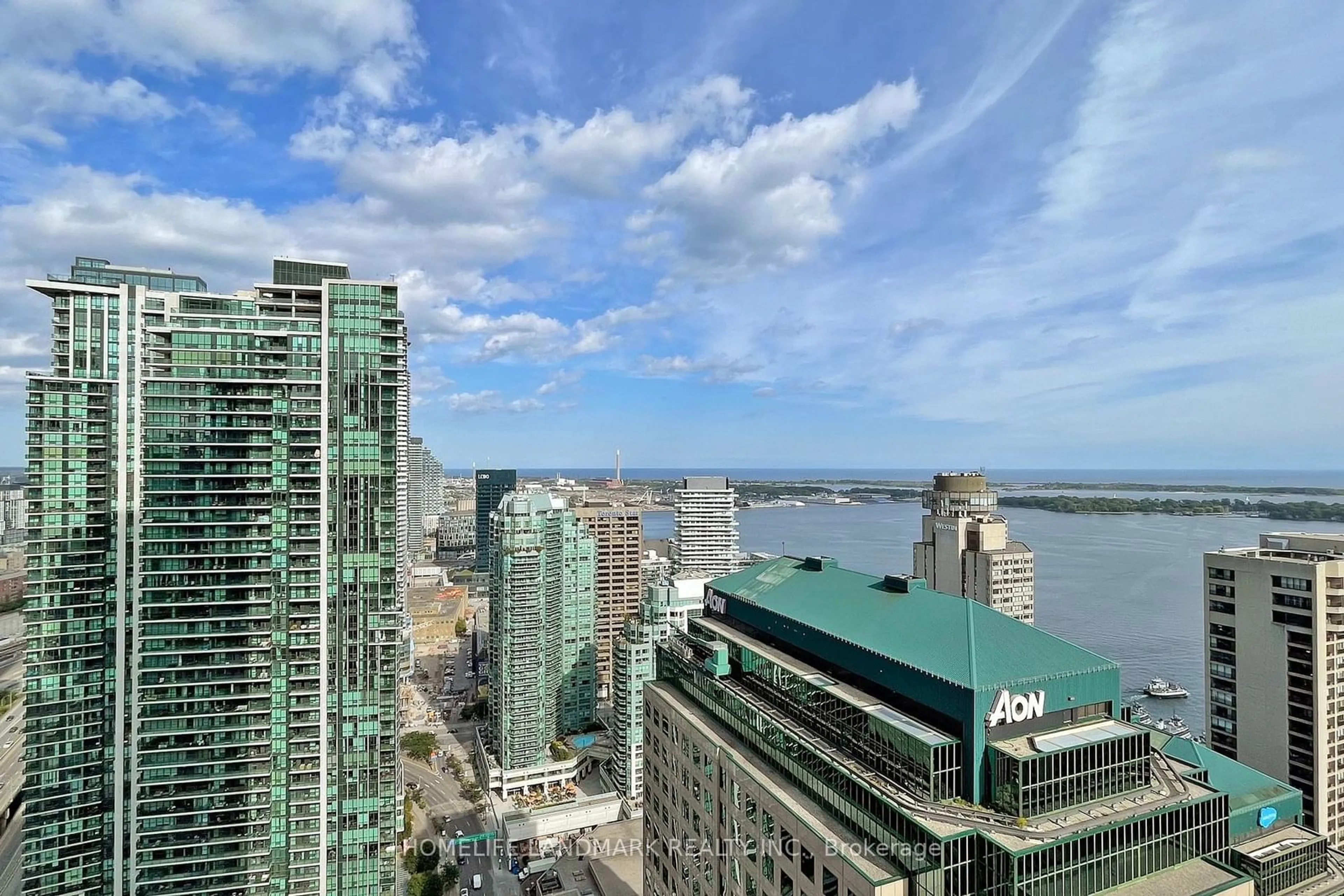 A pic from exterior of the house or condo, the view of city buildings for 88 Harbour St #4107, Toronto Ontario M5J 1B7