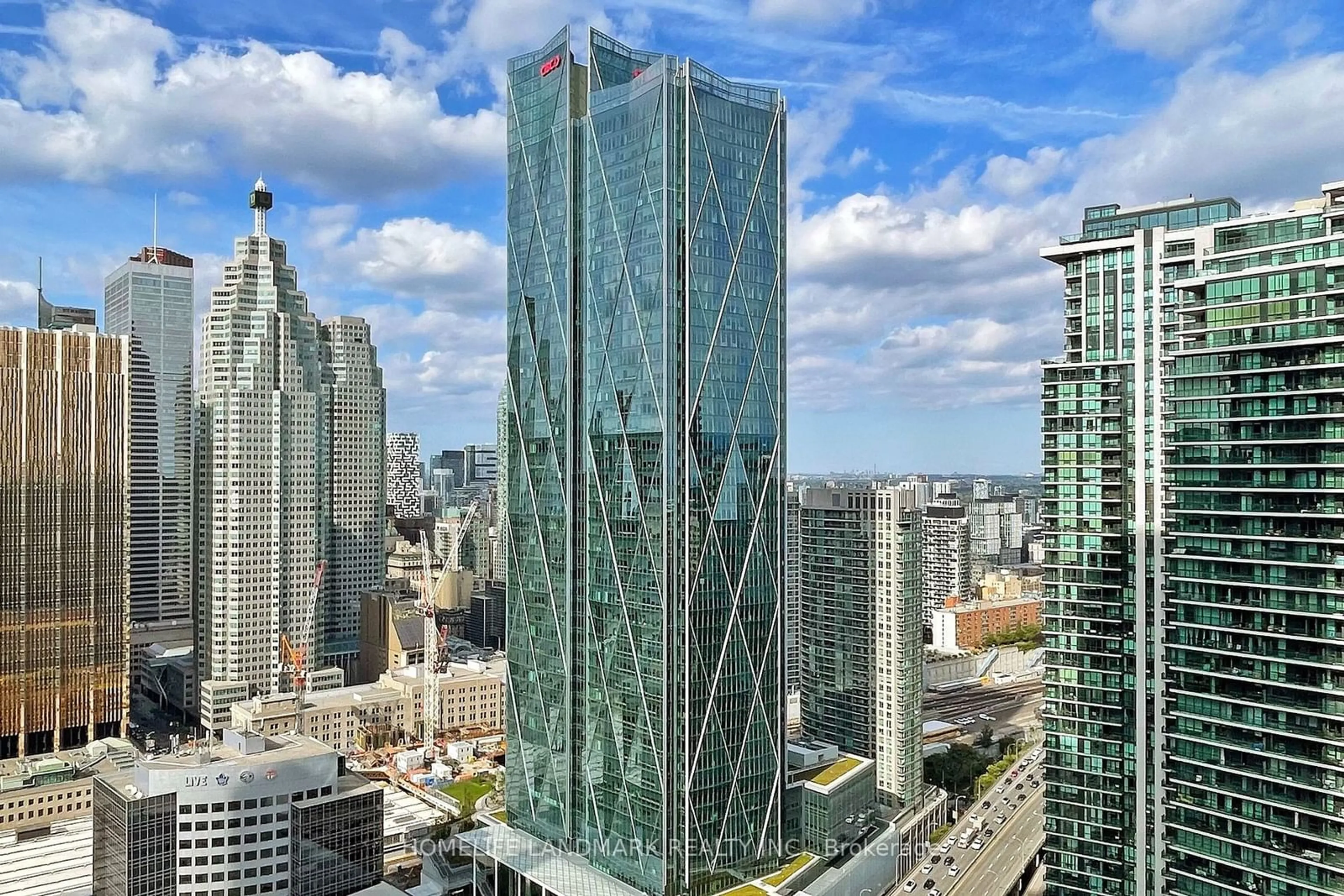 A pic from exterior of the house or condo, the view of city buildings for 88 Harbour St #4107, Toronto Ontario M5J 1B7