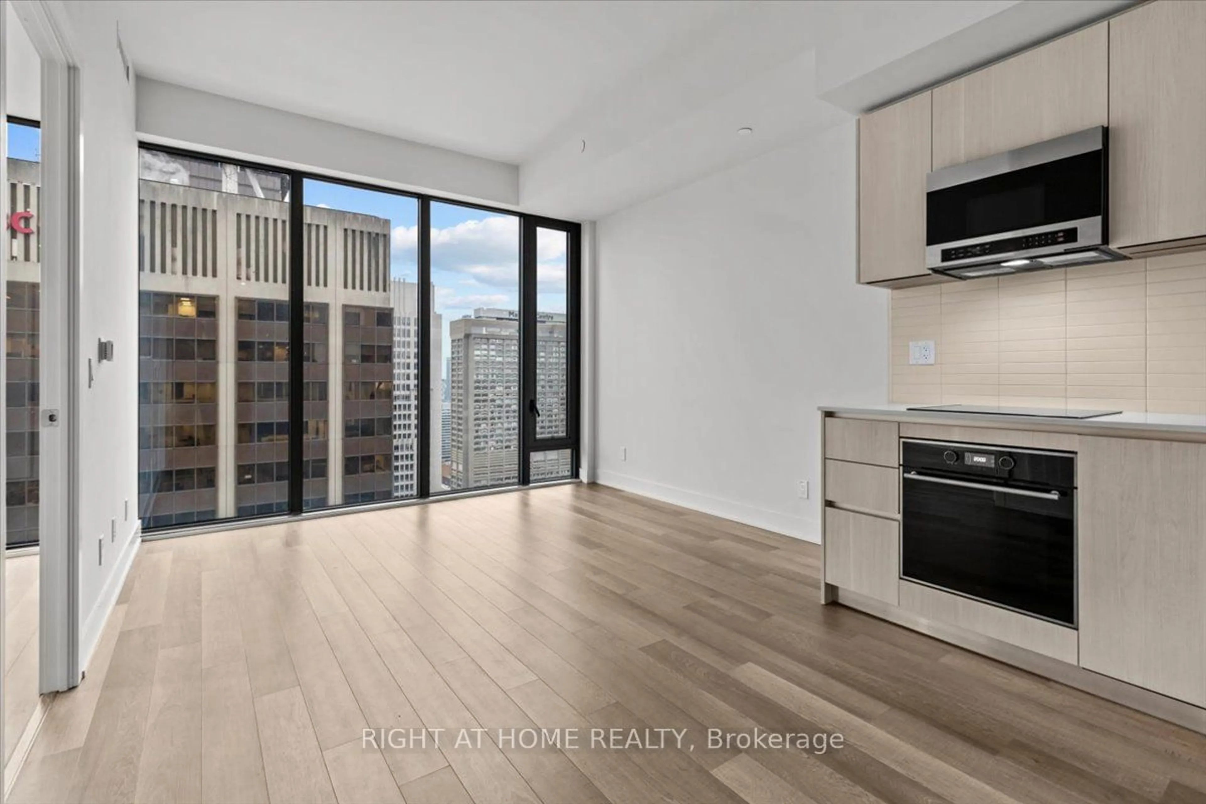 A pic of a room, wood floors for 8 Cumberland St #4205, Toronto Ontario M4W 0B6