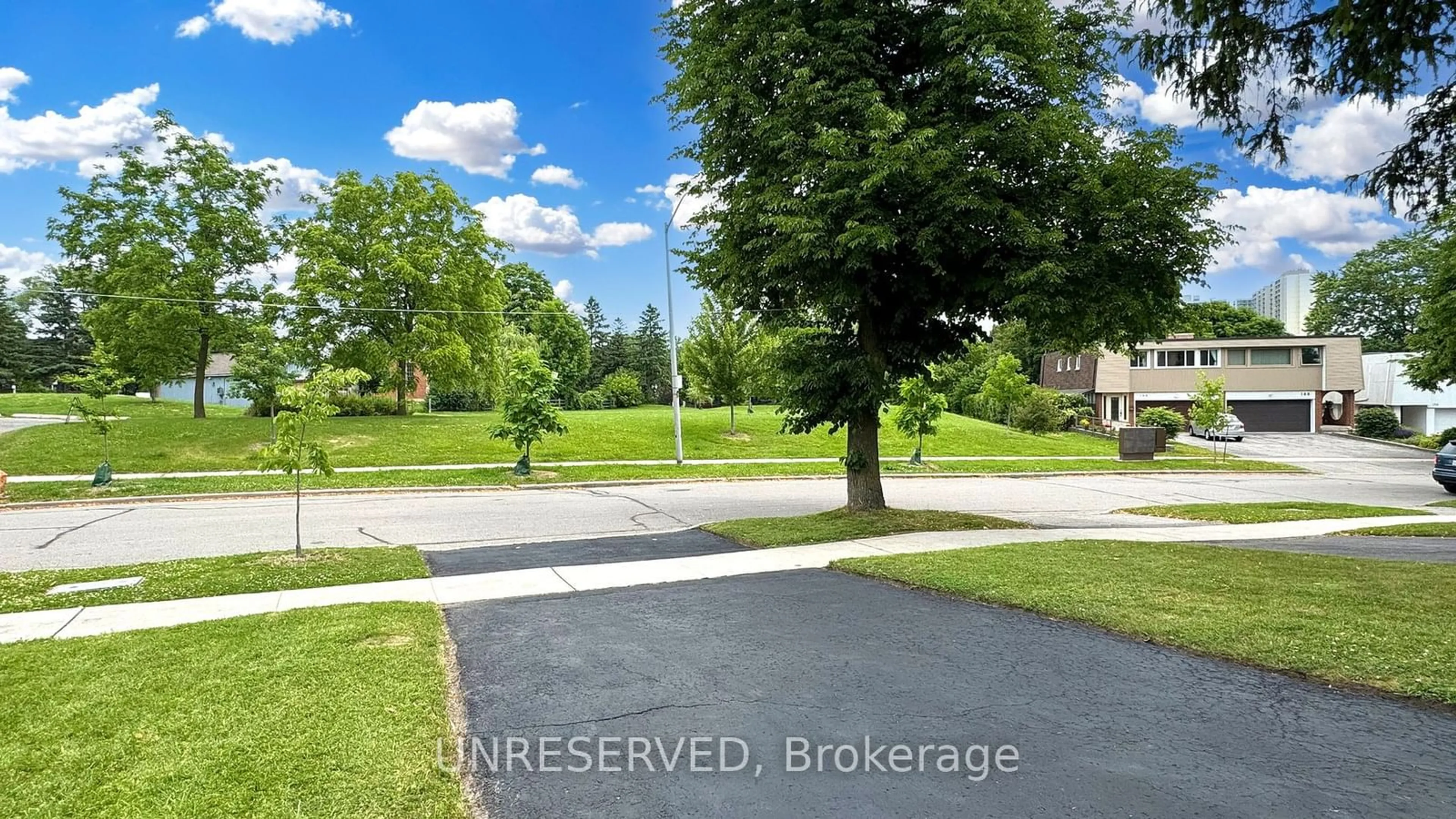 Frontside or backside of a home, the street view for 157 Angus Dr, Toronto Ontario M2J 2W9