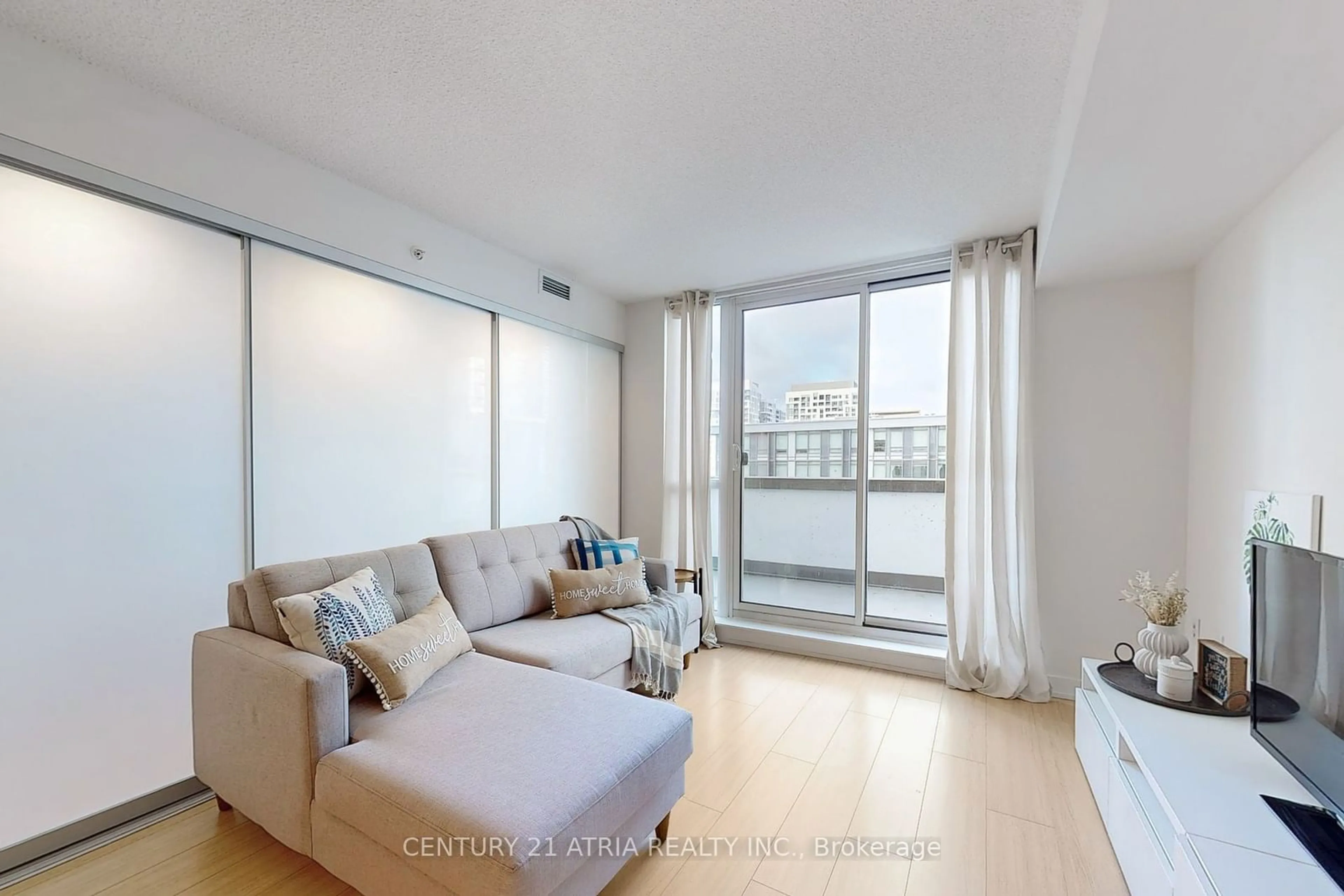 Living room, wood floors for 85 Queens Wharf Rd #810, Toronto Ontario M5V 0J9