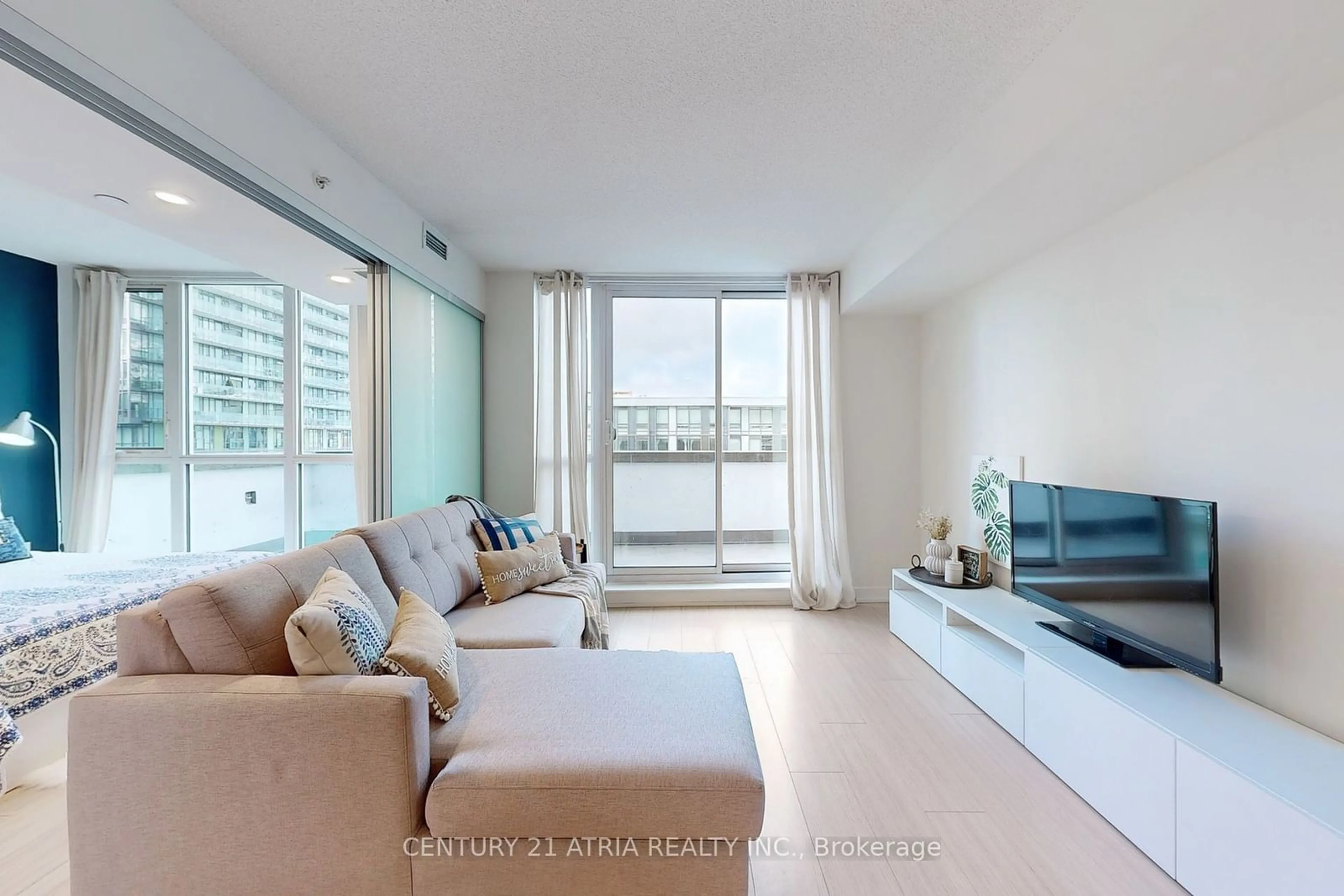 Living room, wood floors for 85 Queens Wharf Rd #810, Toronto Ontario M5V 0J9