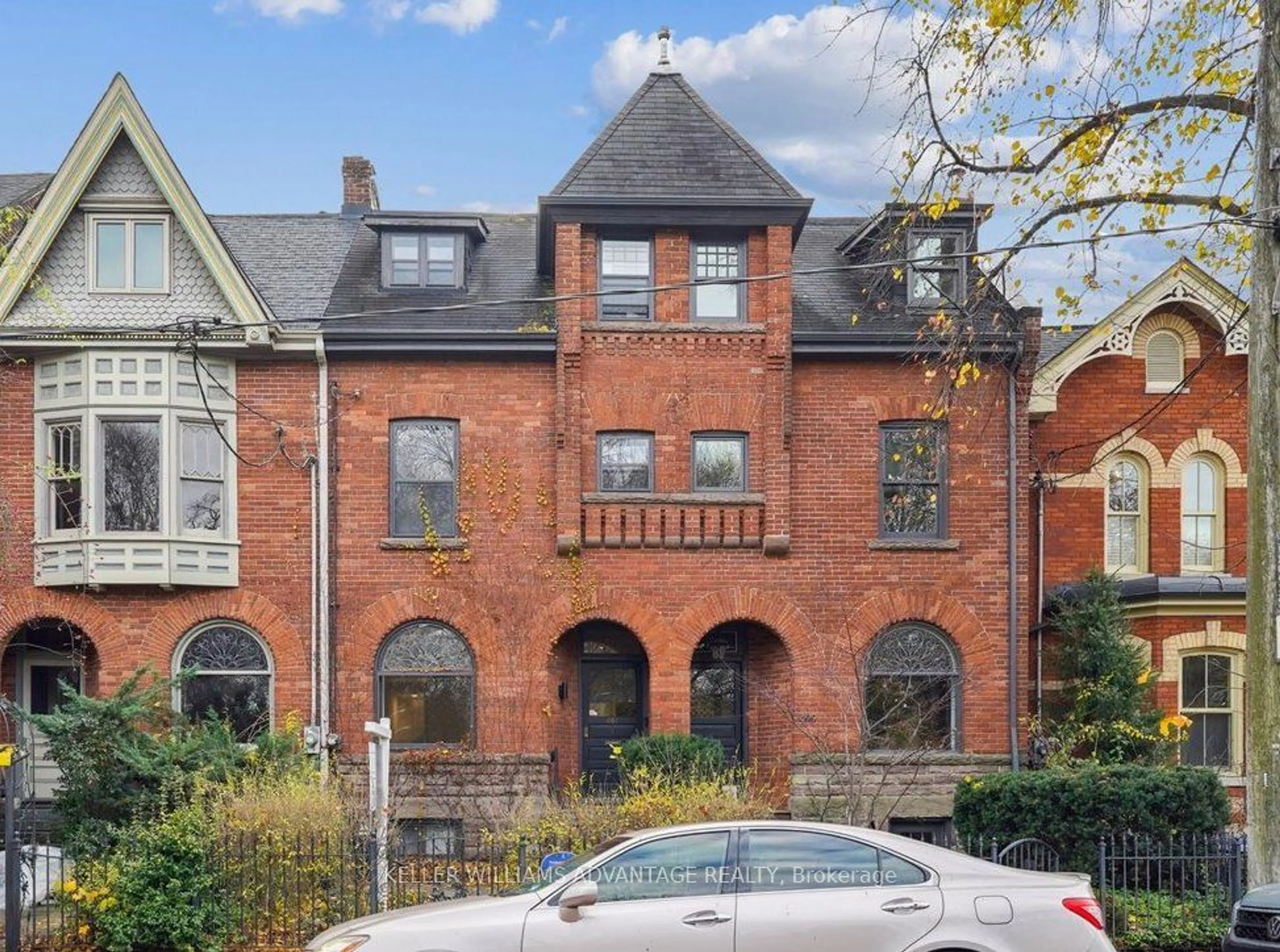 Home with brick exterior material for 401 Carlton St, Toronto Ontario M5A 2M3