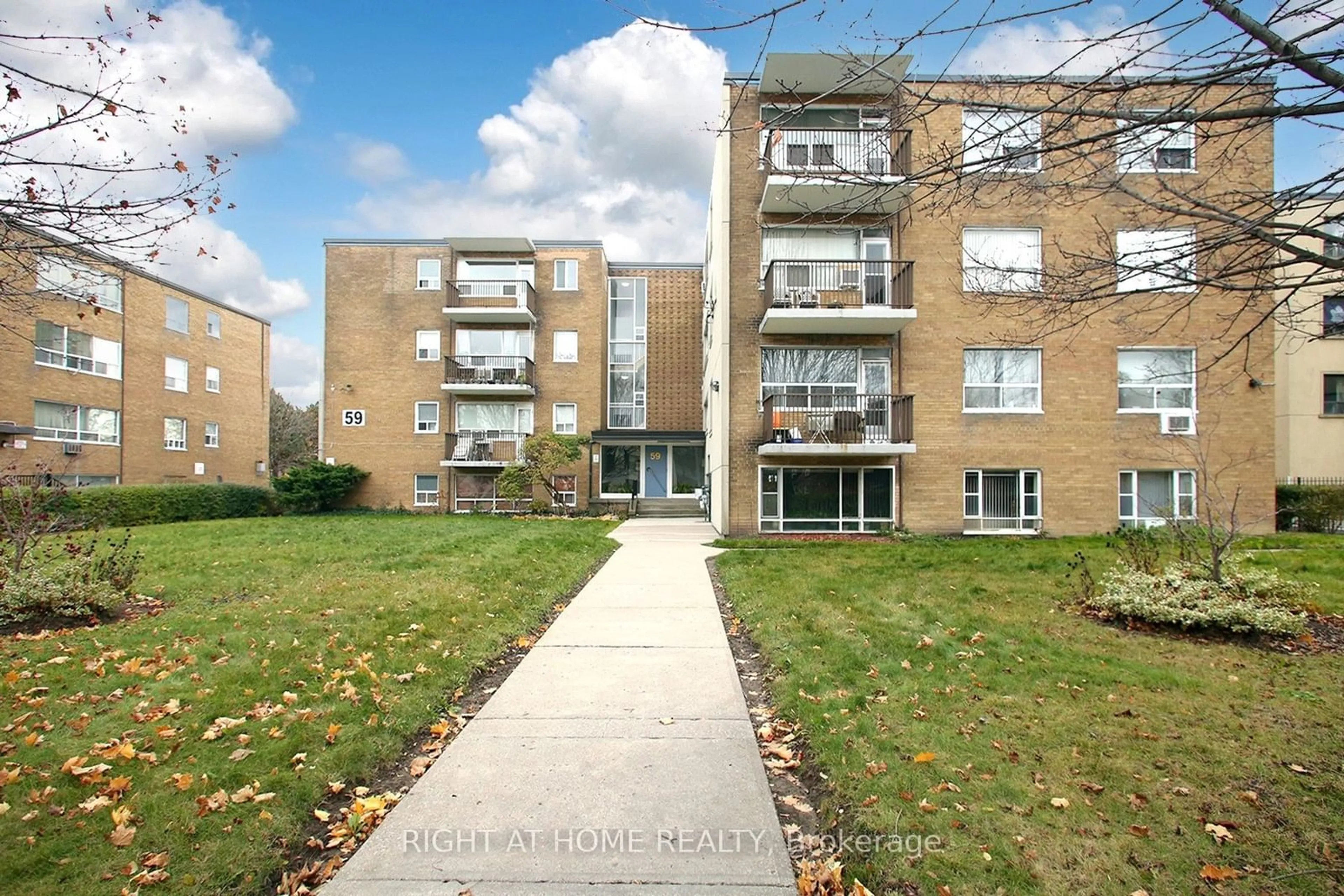 A pic from exterior of the house or condo, the front or back of building for 59 Neptune Dr #301, Toronto Ontario M6A 1X2