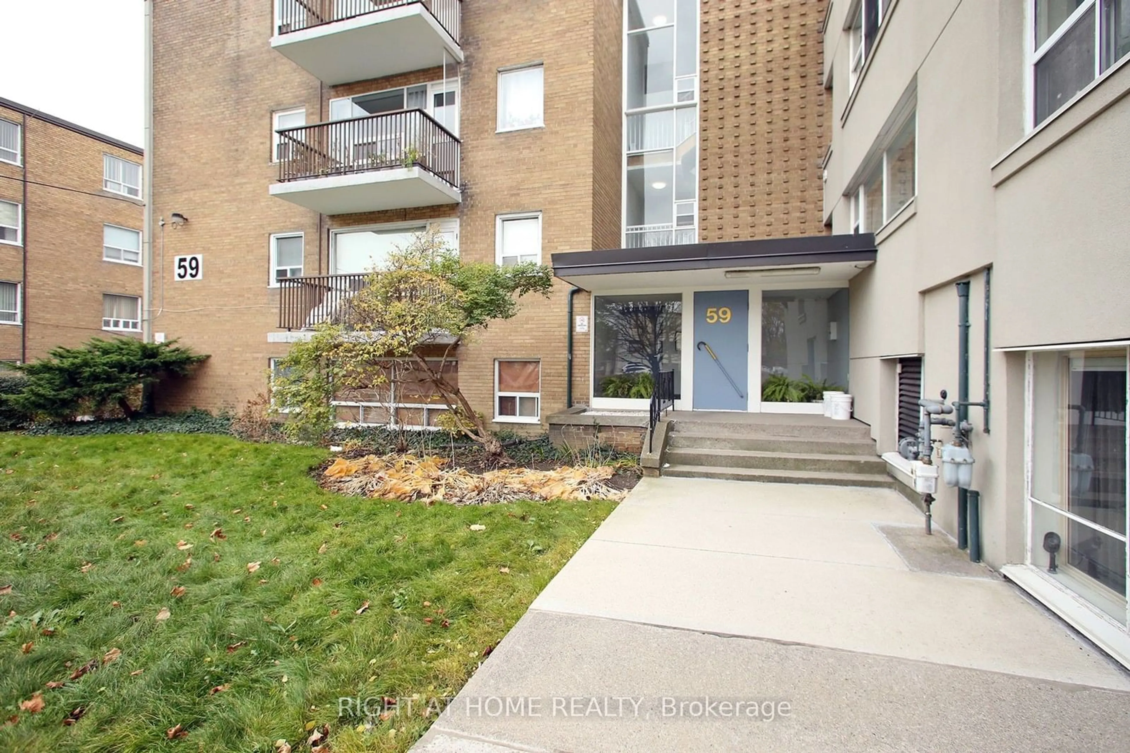 A pic from exterior of the house or condo, the front or back of building for 59 Neptune Dr #301, Toronto Ontario M6A 1X2