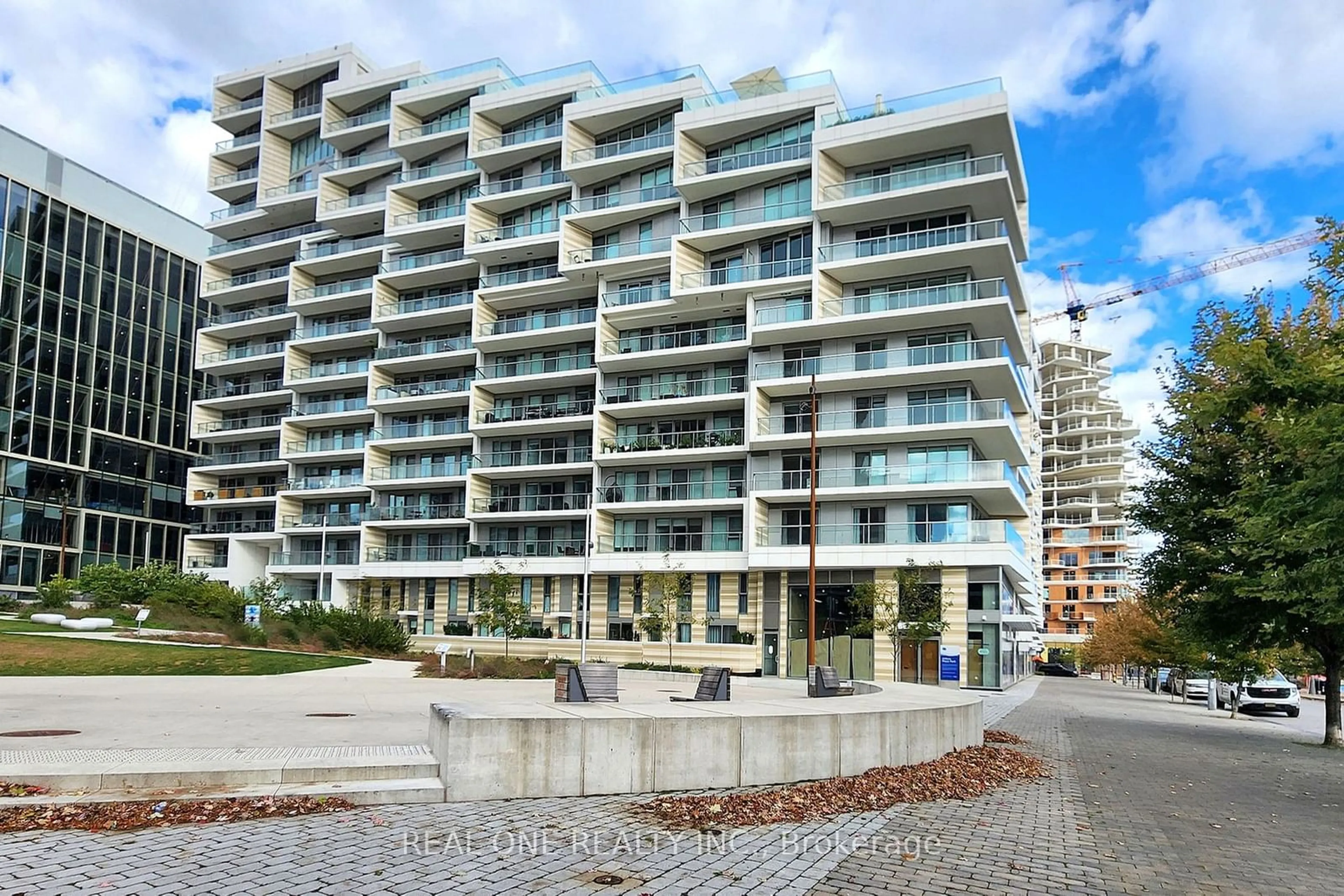 A pic from exterior of the house or condo, the street view for 118 Merchants' Wharf #320, Toronto Ontario M5A 0L3