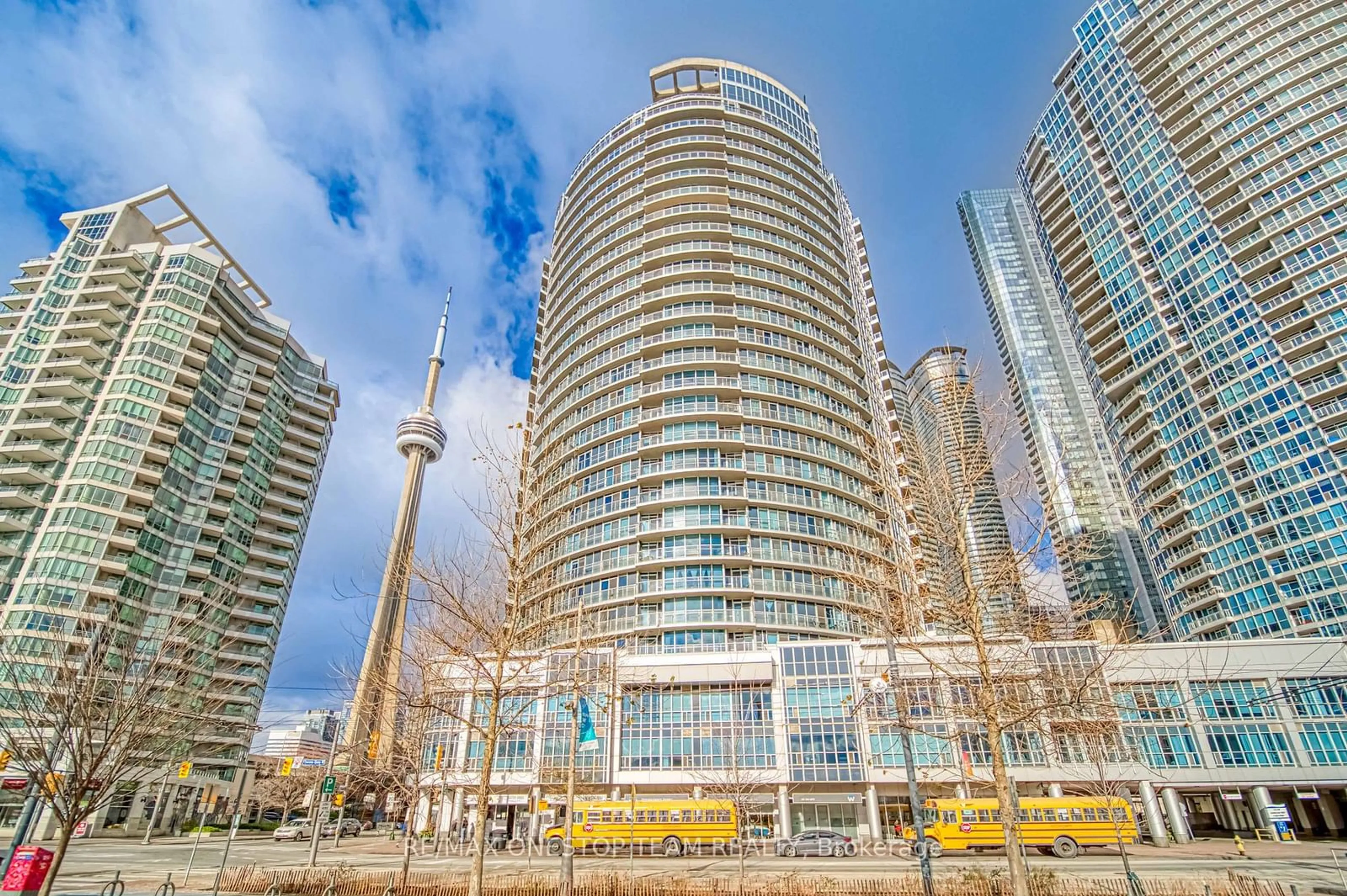 A pic from exterior of the house or condo, the view of city buildings for 218 Queens Quay #1002, Toronto Ontario M5J 2Y6