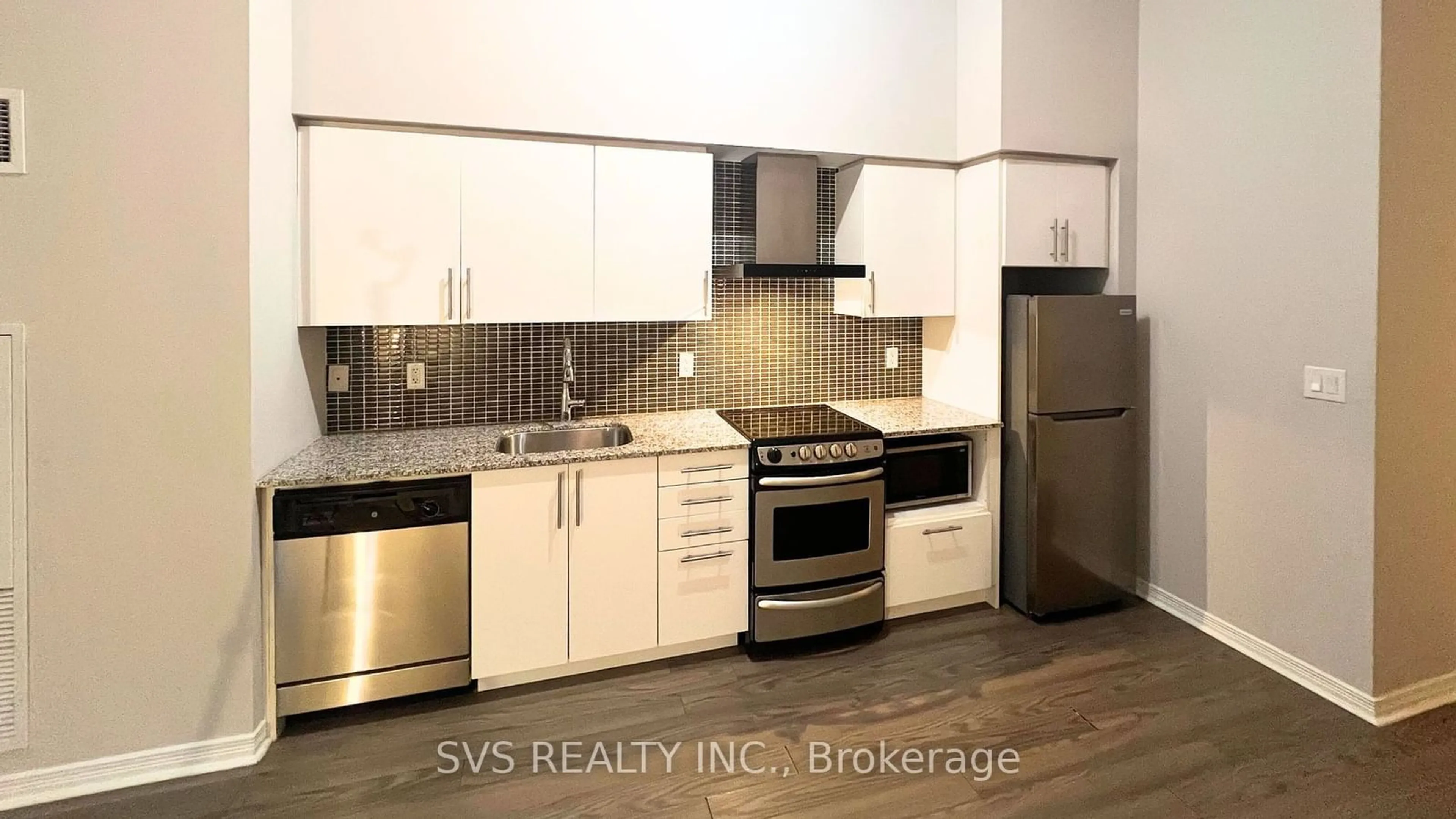 Standard kitchen, wood floors for 352 Front St #212, Toronto Ontario M5V 1B5