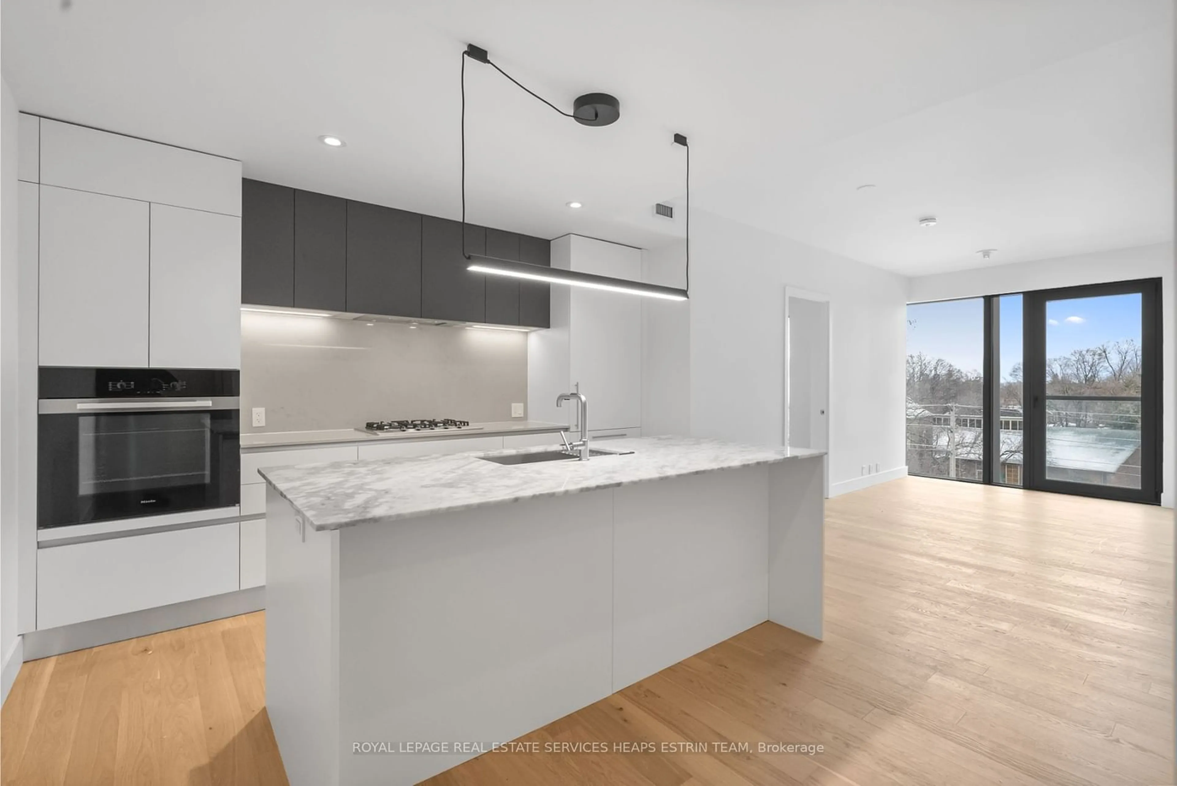 Contemporary kitchen, wood floors for 1414 Bayview Ave #409, Toronto Ontario M4G 3A7