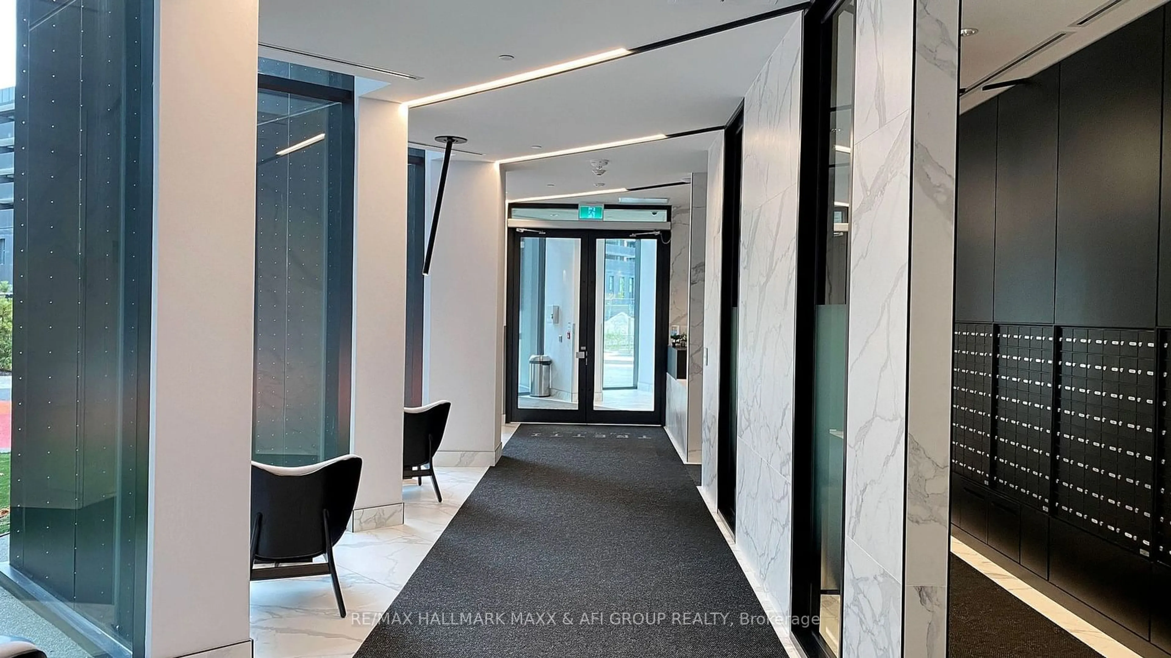 Indoor foyer, cement floor for 30 Tretti Way #304, Toronto Ontario M3H 0E3