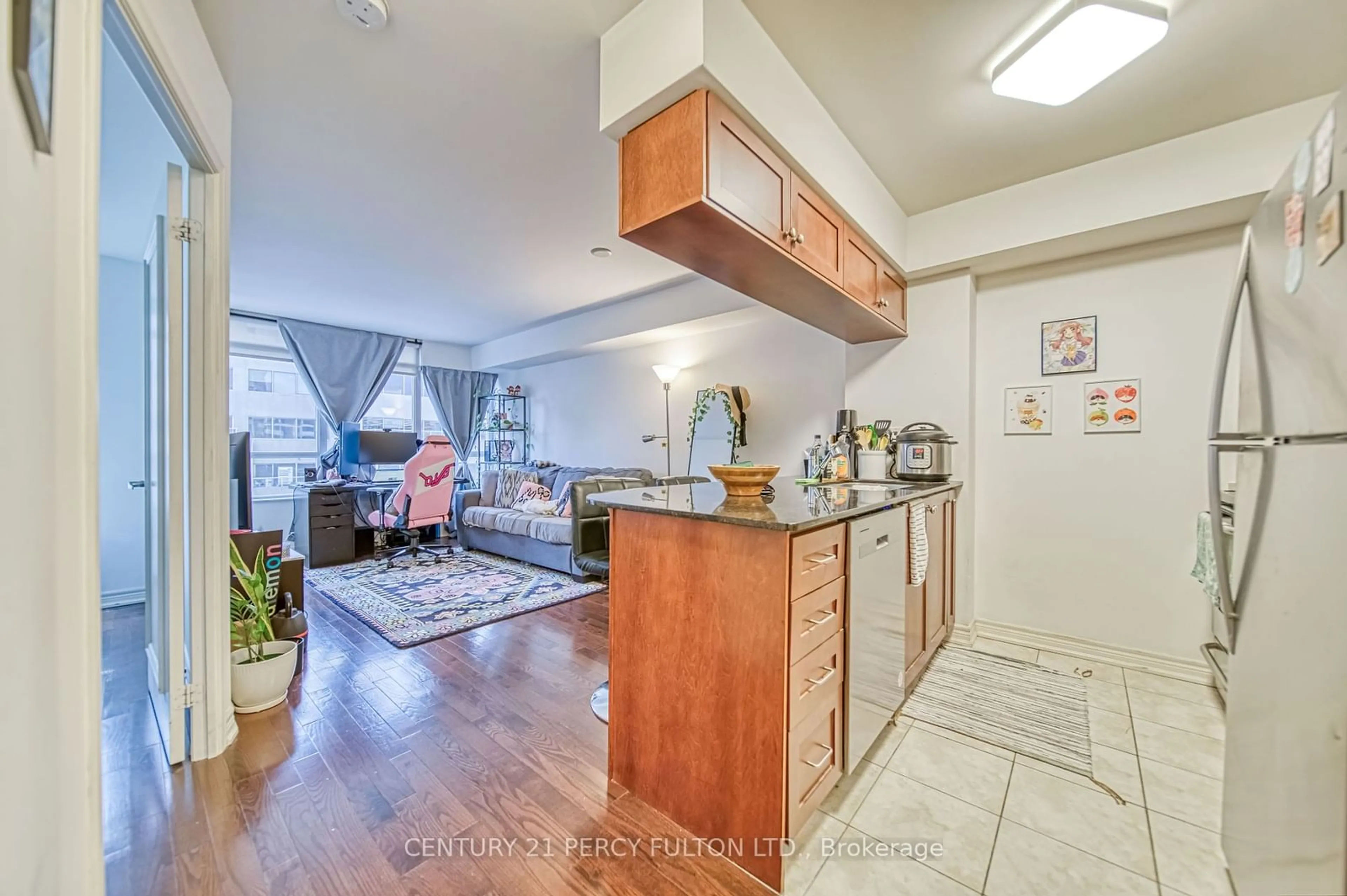 Open concept kitchen for 60 St Clair Ave #906, Toronto Ontario M4V 1M1