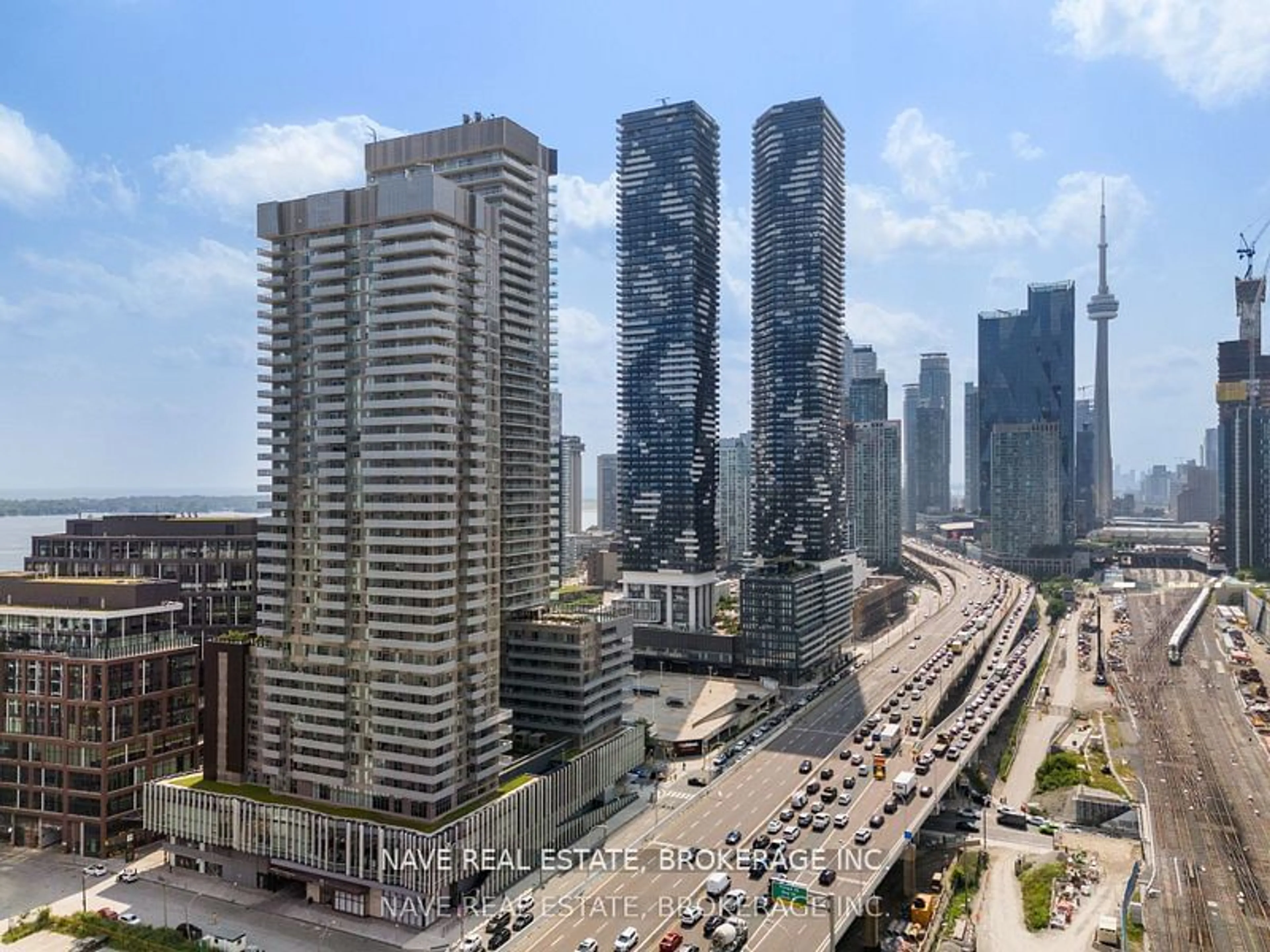 A pic from exterior of the house or condo, the view of city buildings for 20 Richardson St #2210, Toronto Ontario M5V 0S6