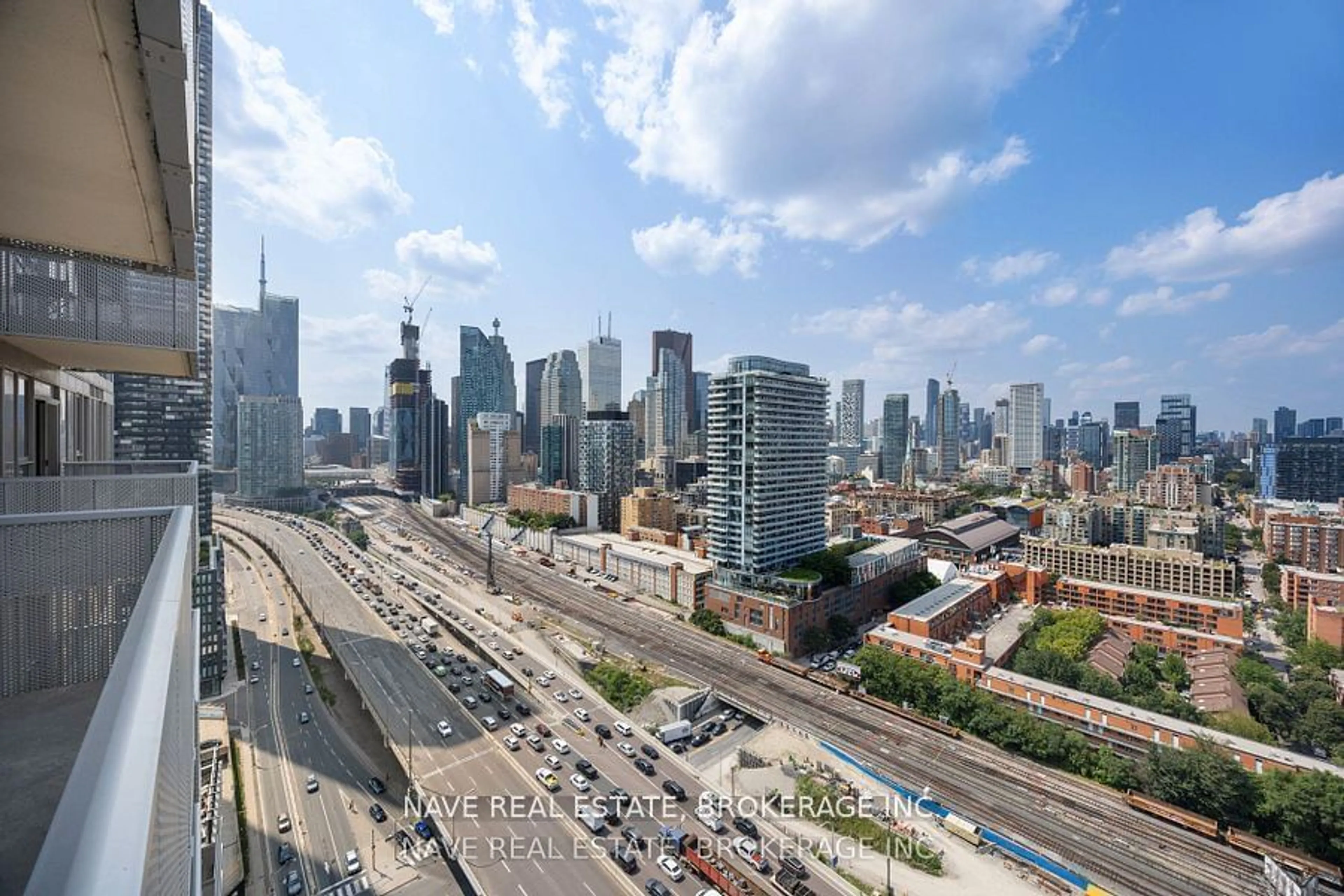 A pic from exterior of the house or condo, the view of city buildings for 20 Richardson St #2210, Toronto Ontario M5V 0S6