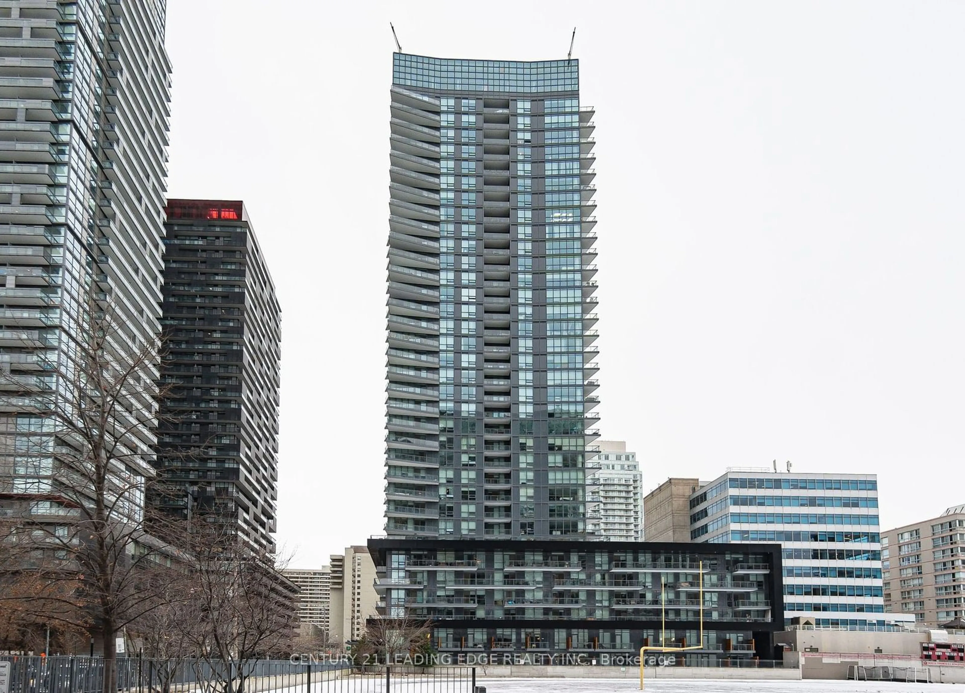 A pic from exterior of the house or condo, the view of city buildings for 30 Roehampton Ave #506, Toronto Ontario M4P 0B9