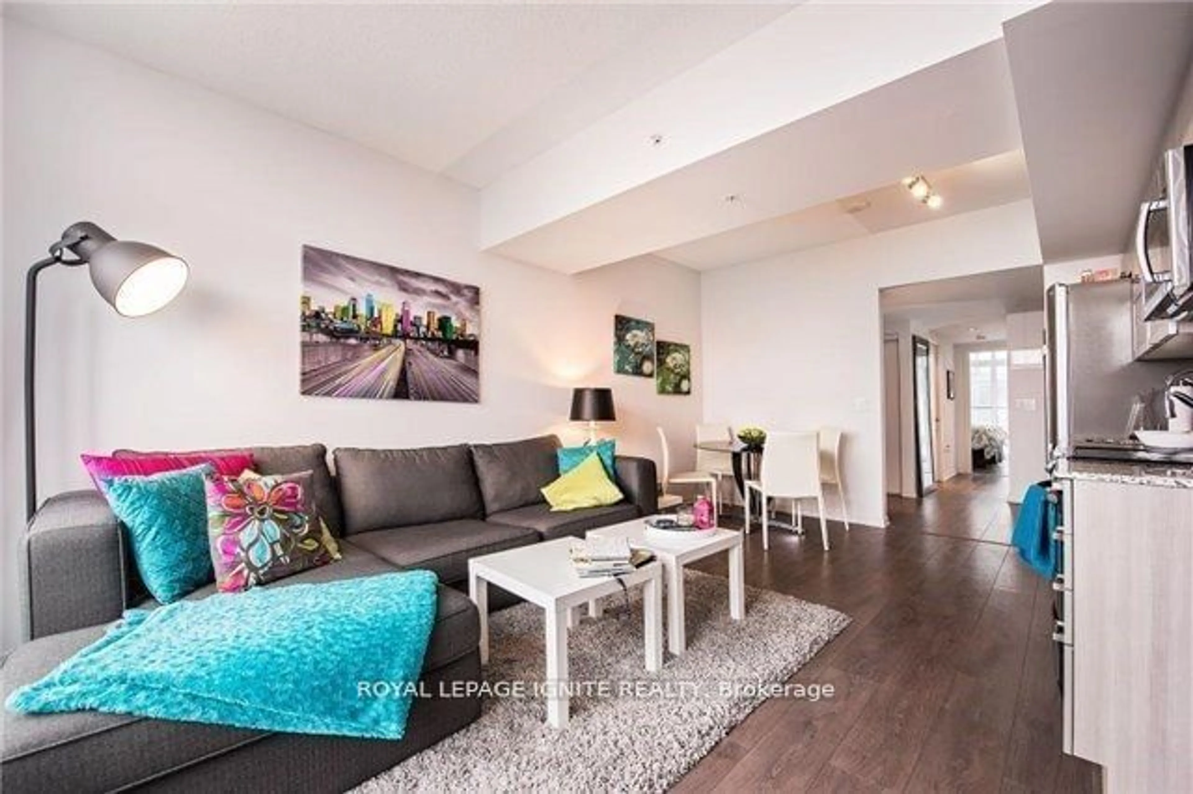 Living room with furniture, wood/laminate floor for 36 Lisgar St #1620E, Toronto Ontario M6J 0C7