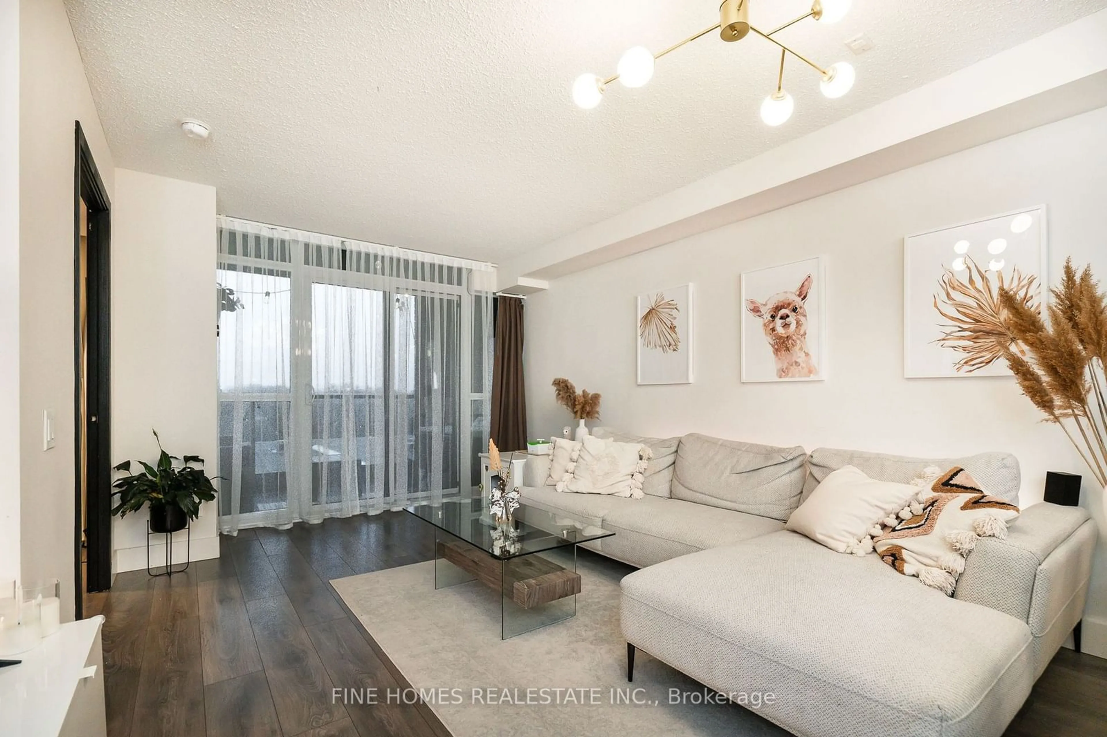 Living room with furniture, wood/laminate floor for 525 Wilson Ave #505, Toronto Ontario M3H 1V1